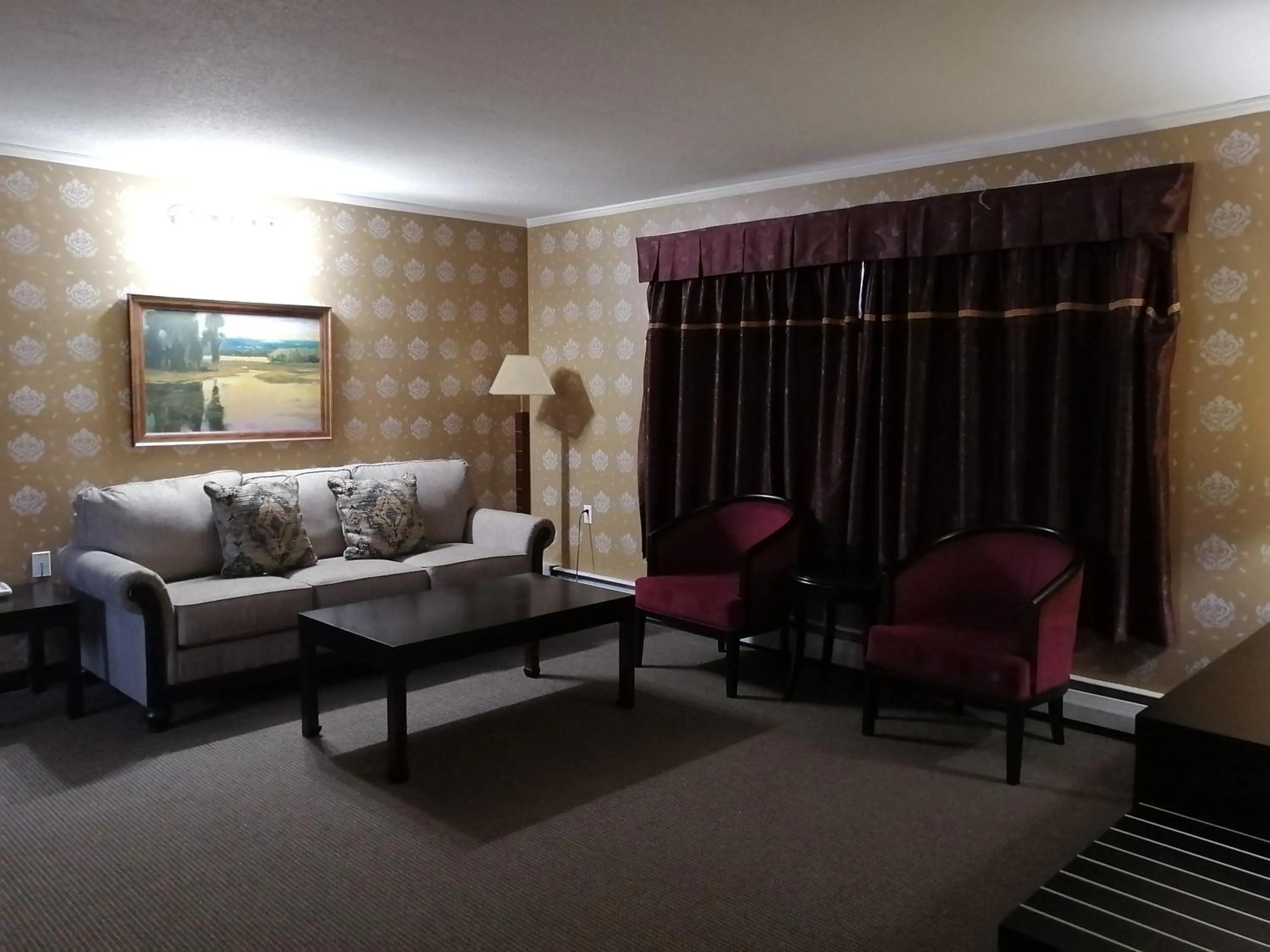 Living room in Alpine Inn & Suites