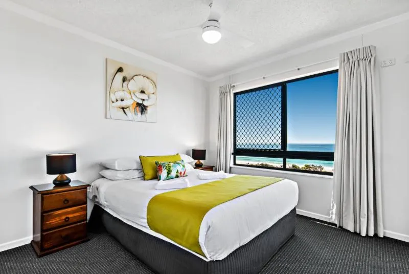 Bed in San Marino by the Sea Apartments