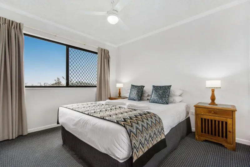 Bed in San Marino by the Sea Apartments