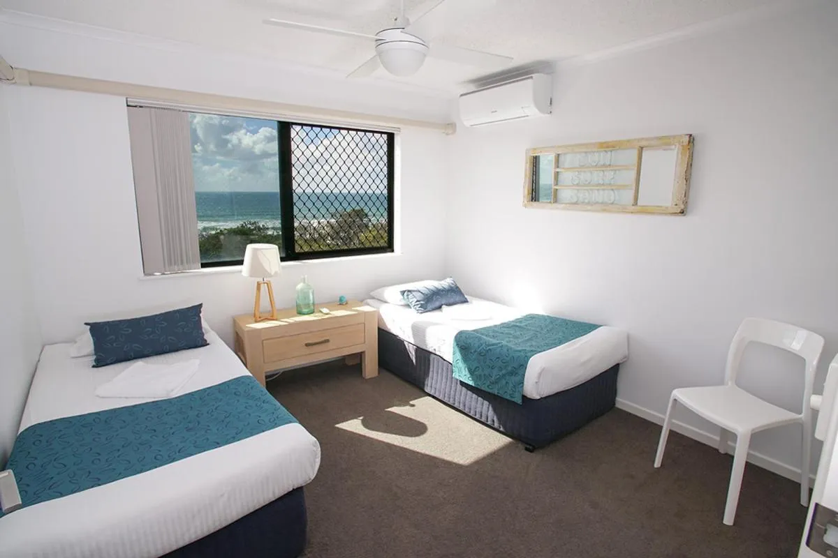 Bed in San Marino by the Sea Apartments
