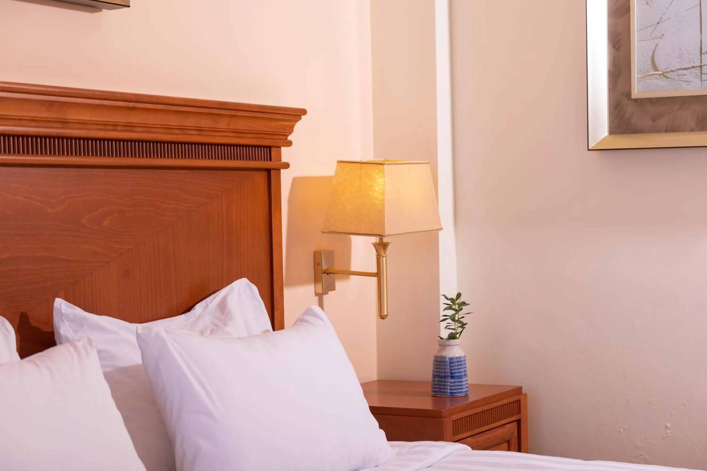 Bed in Avalon Palace Hotel