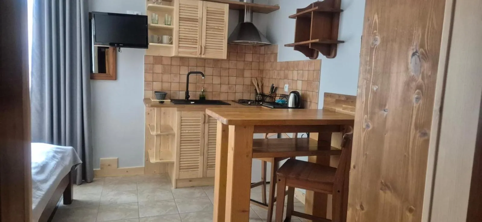 Kitchen or kitchenette in Aparthotel Pod Nosalem