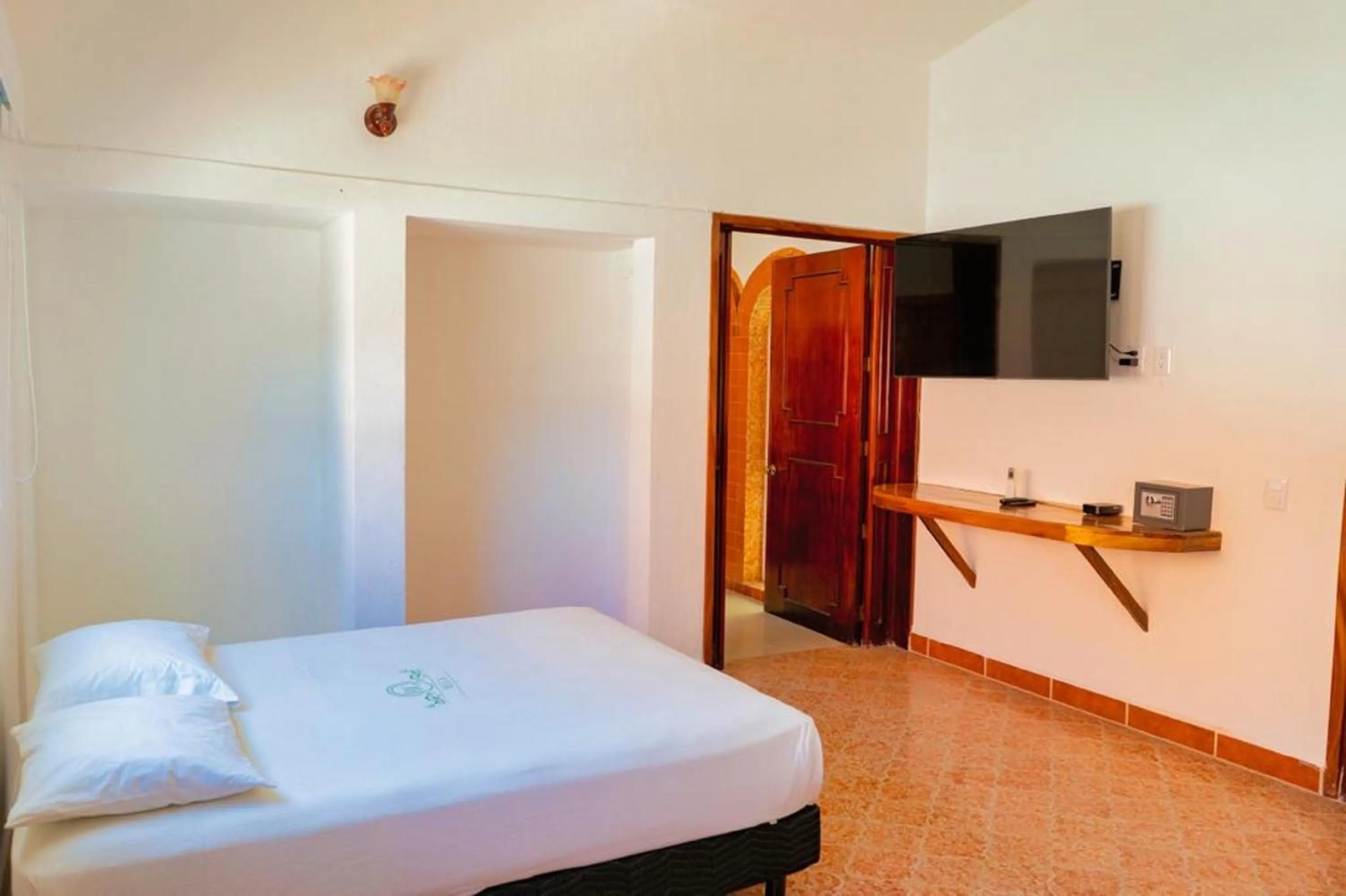Bedroom, Bed in Hotel Rega Suites Guayabitos - Family & Kitchen