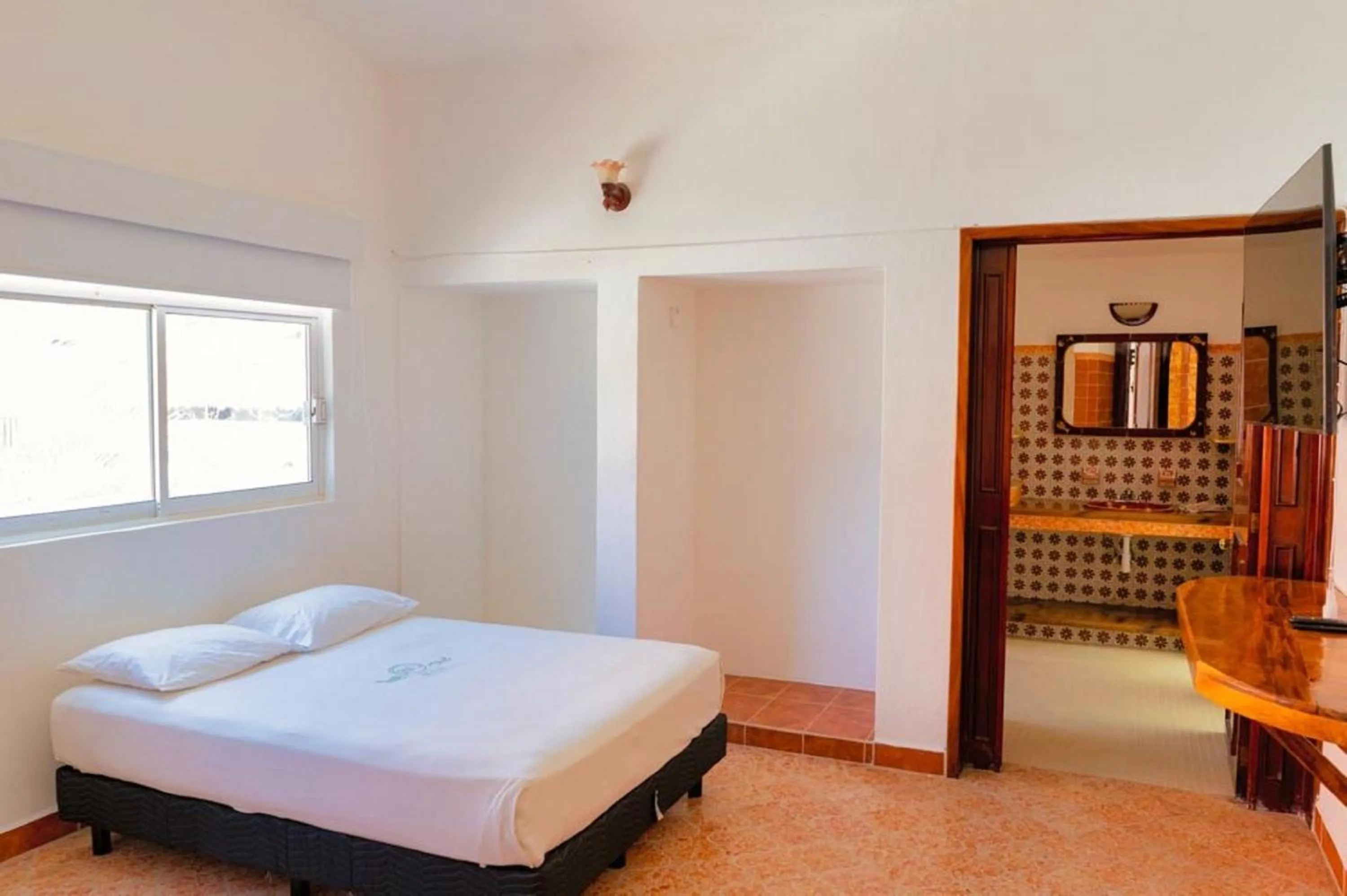 Bedroom, Bed in Hotel Rega Suites Guayabitos - Family & Kitchen