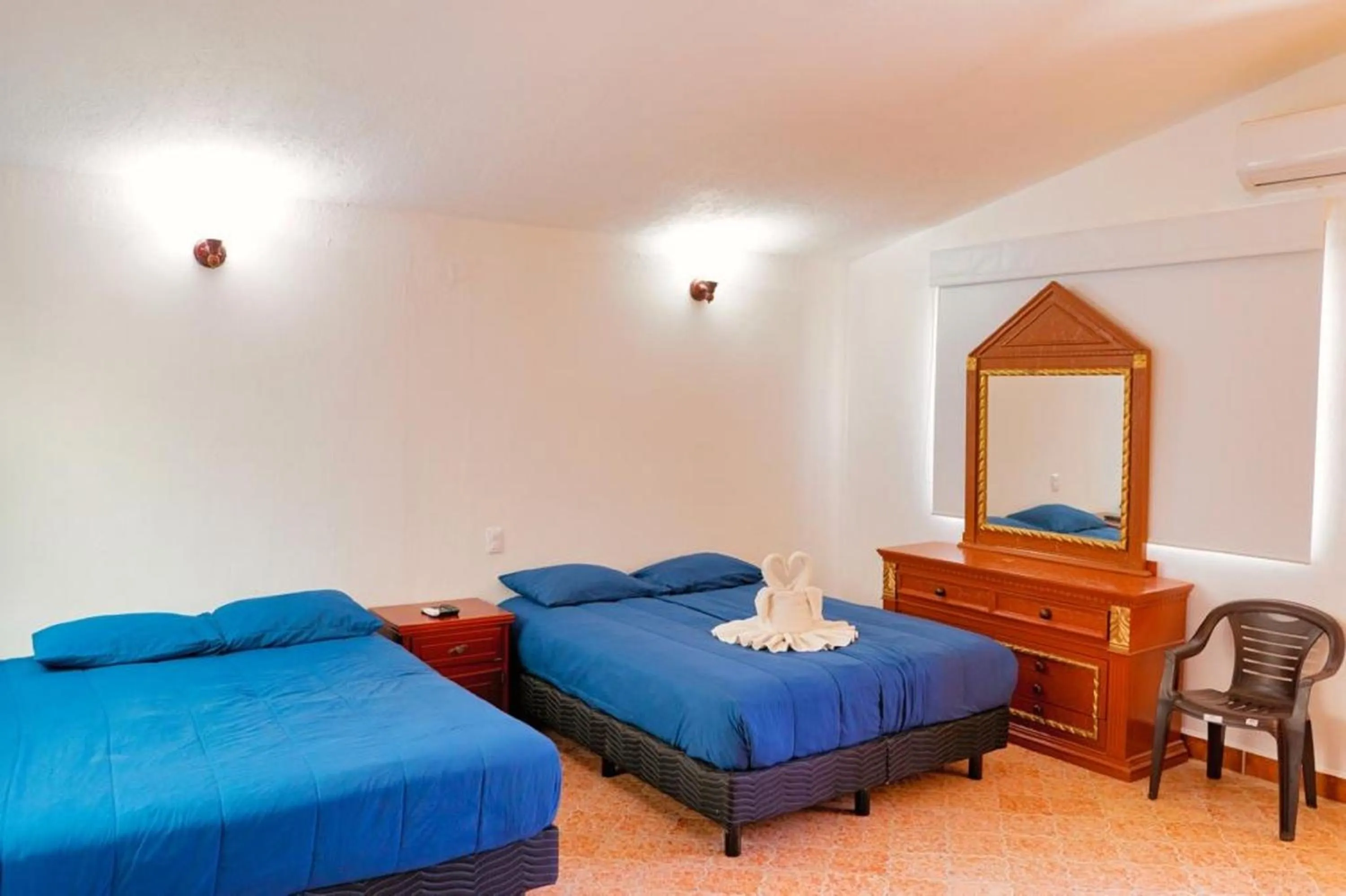 Bedroom, Bed in Hotel Rega Suites Guayabitos - Family & Kitchen