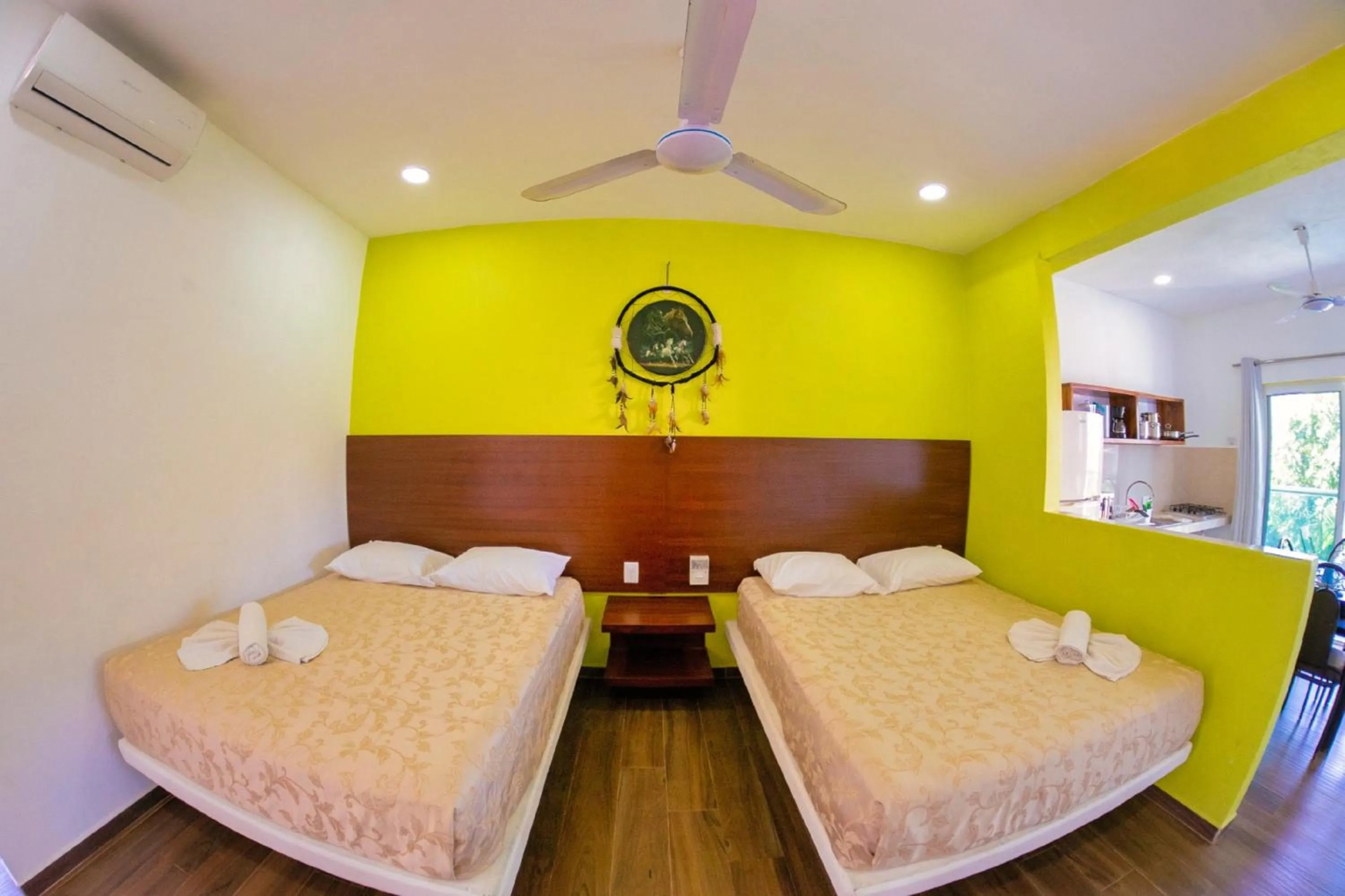 Bedroom, Bed in Hotel Rega Suites Guayabitos - Family & Kitchen