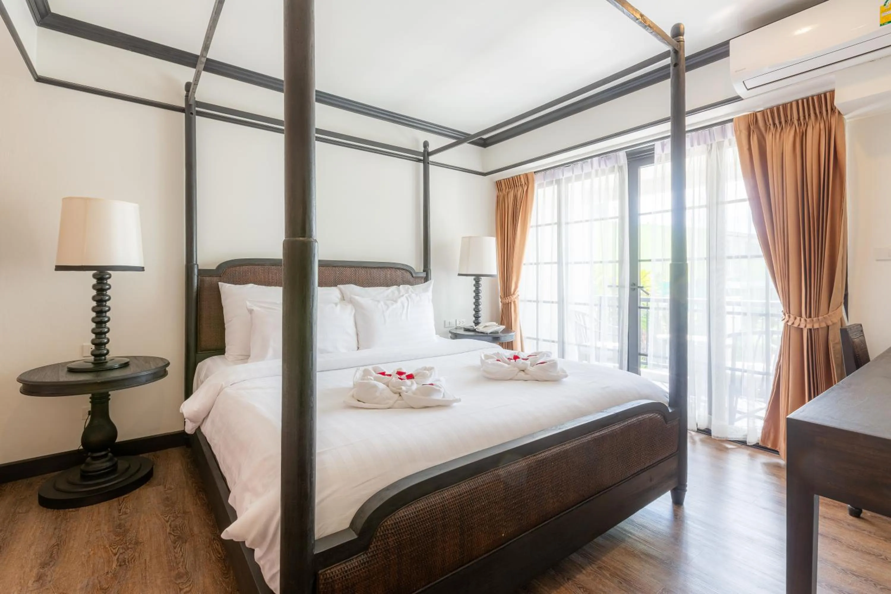 Bed in MORA Boutique Hotel