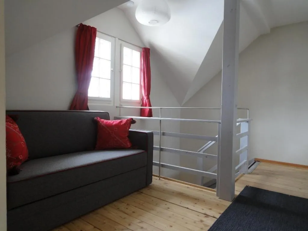Seating area, Bed in Chalet INN