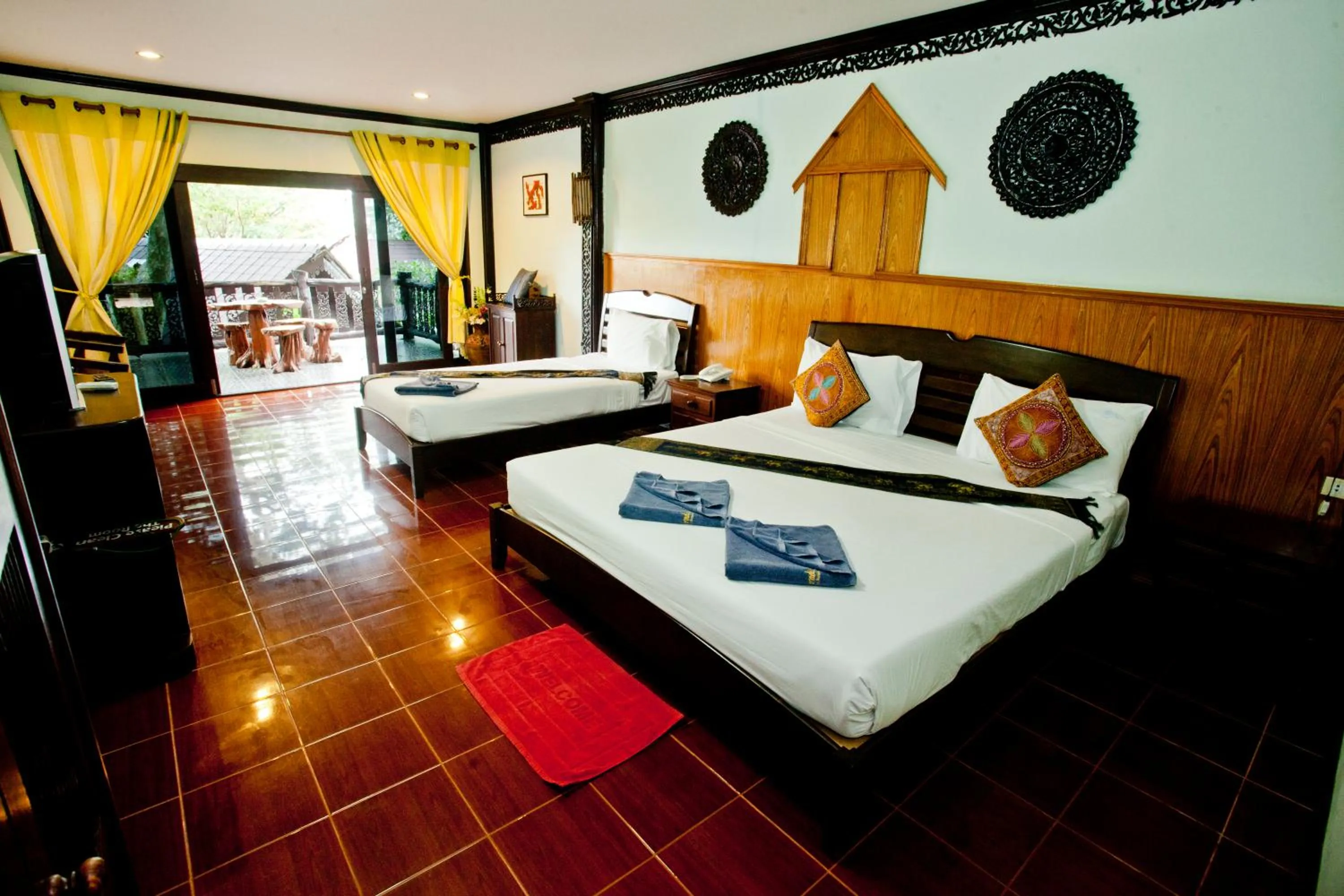 Bed in Paradise Pearl Bungalows