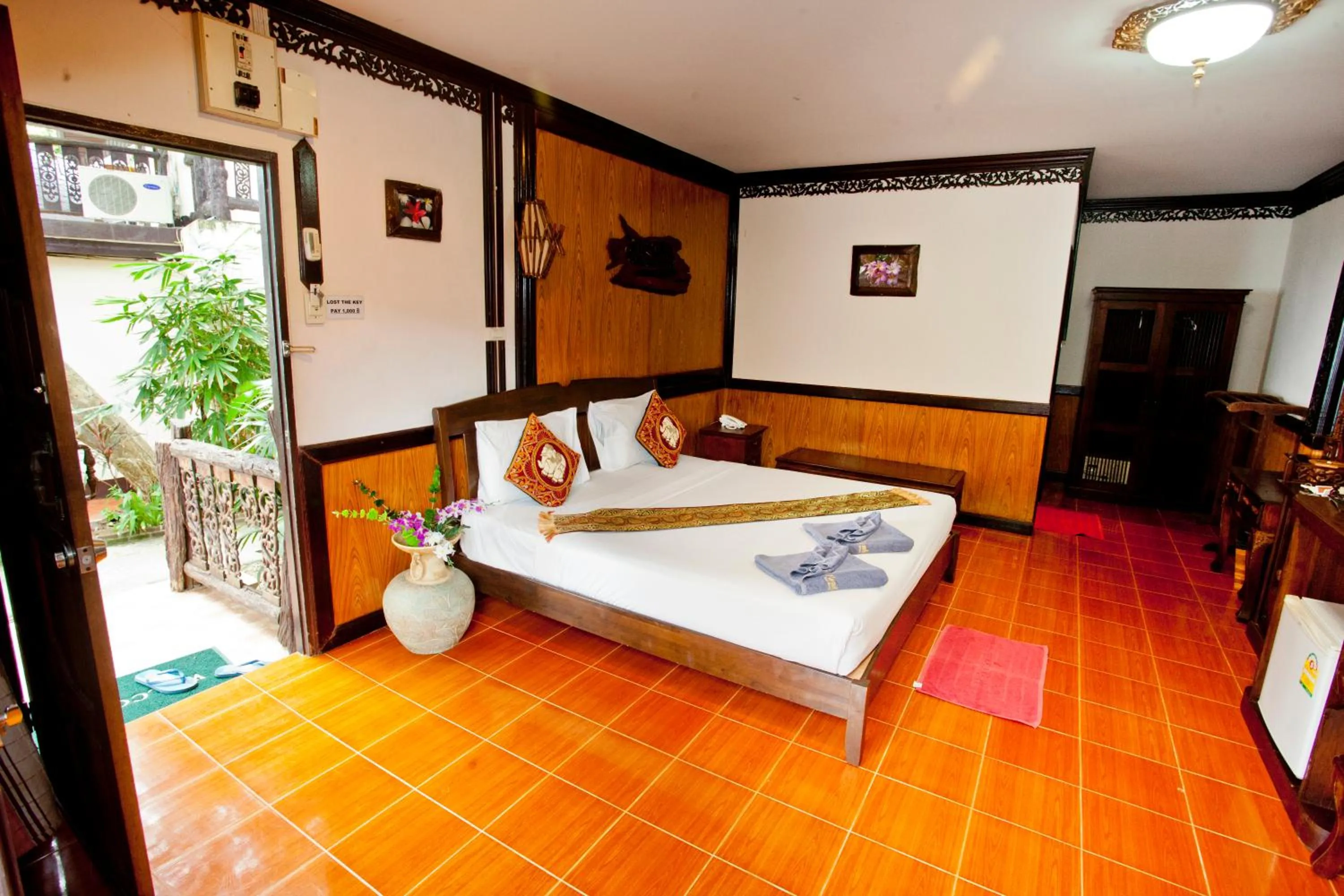 Bed in Paradise Pearl Bungalows