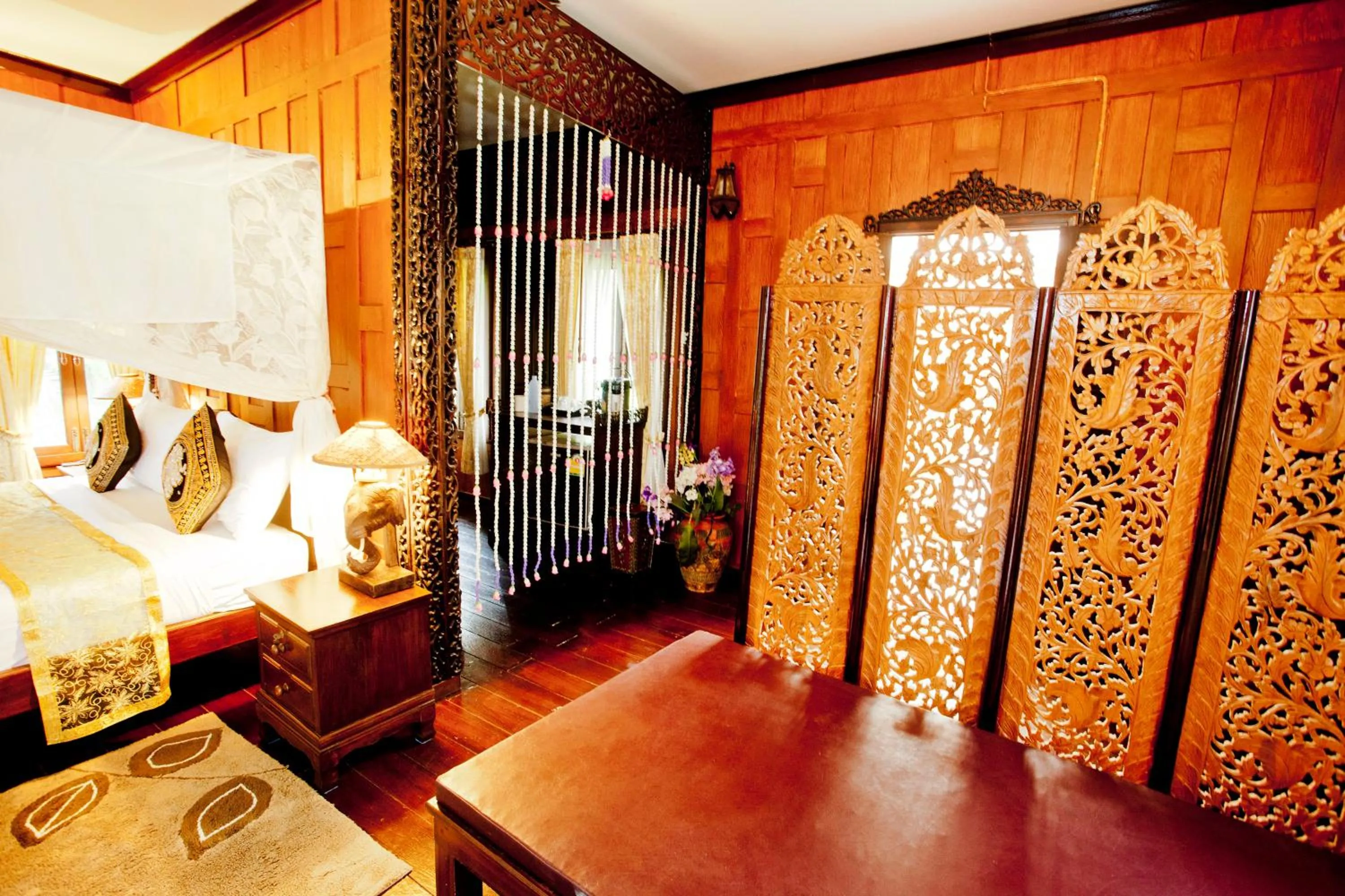 Bed in Paradise Pearl Bungalows