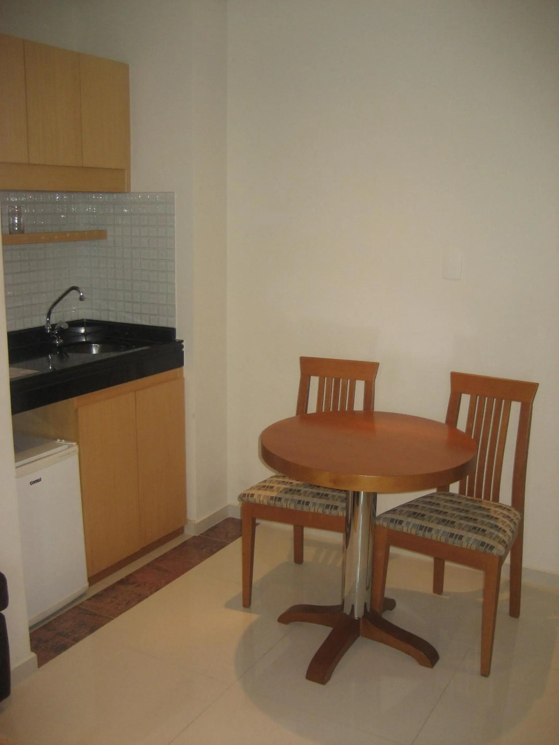 Kitchen or kitchenette in Brasília Santana Gold Flat