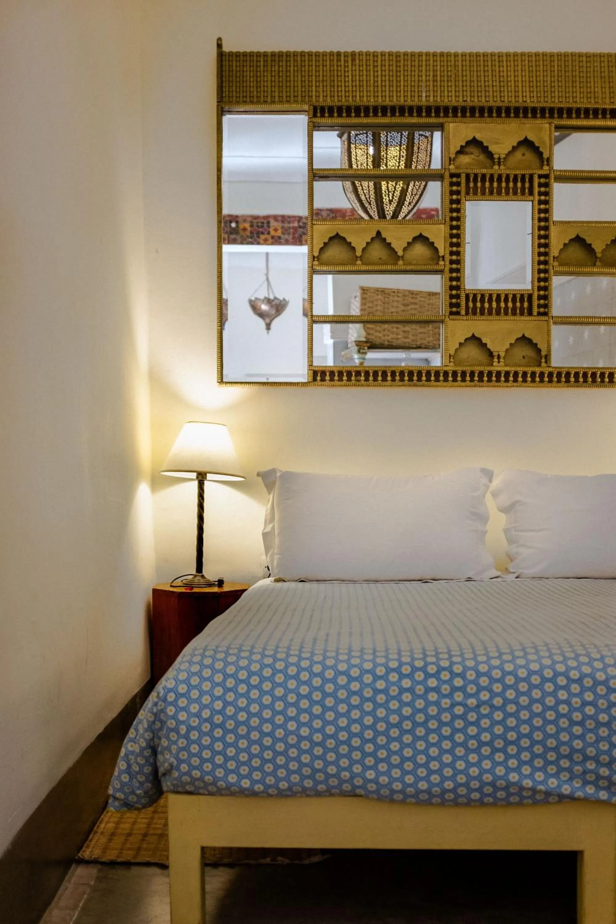 Bed in Riad Le Coq Berbère