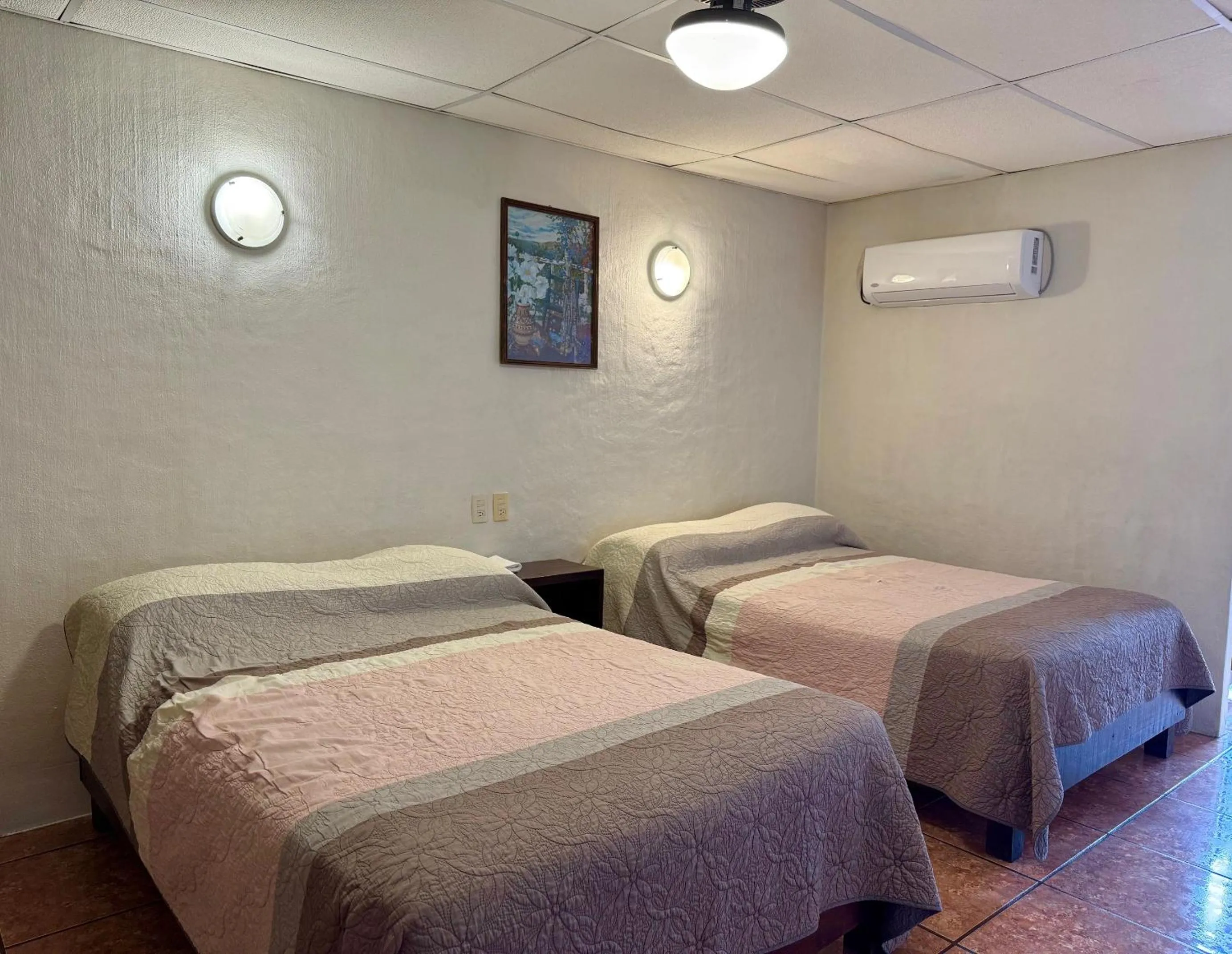 Bed in Hotel Uke Inn Terán