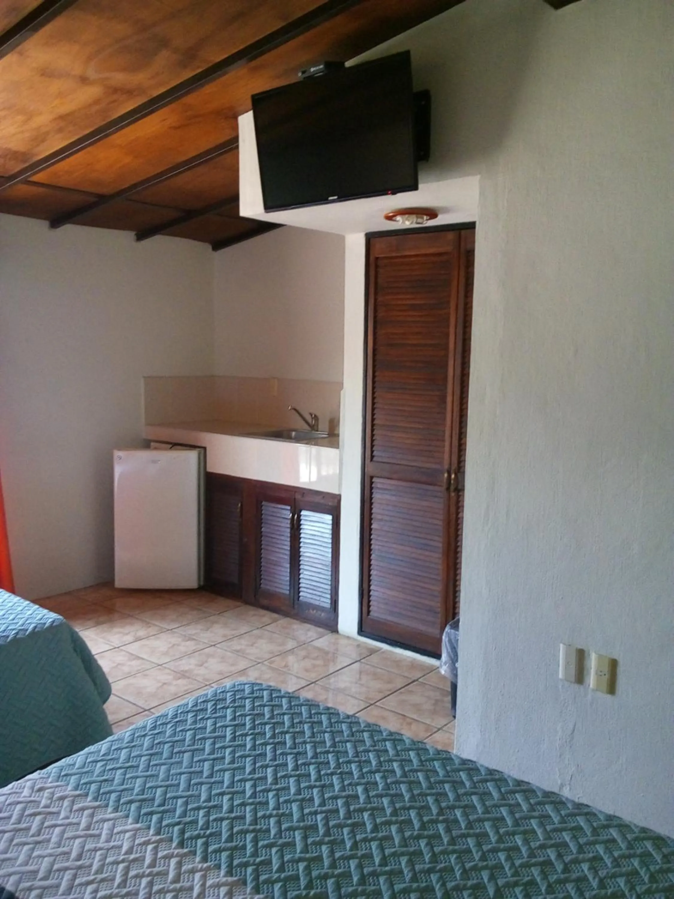 Bed in Hotel Uke Inn Terán