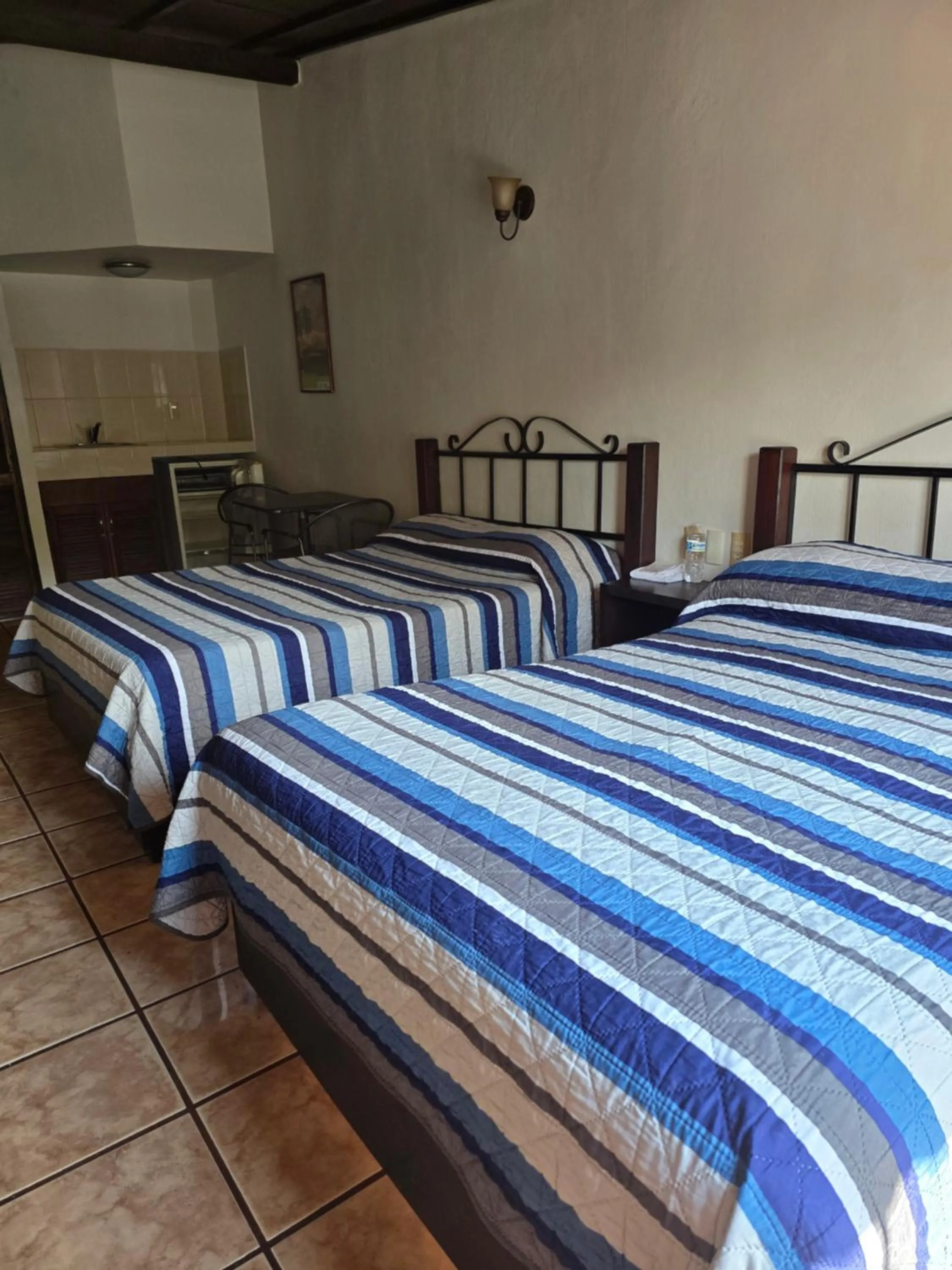 Bed in Hotel Uke Inn Terán