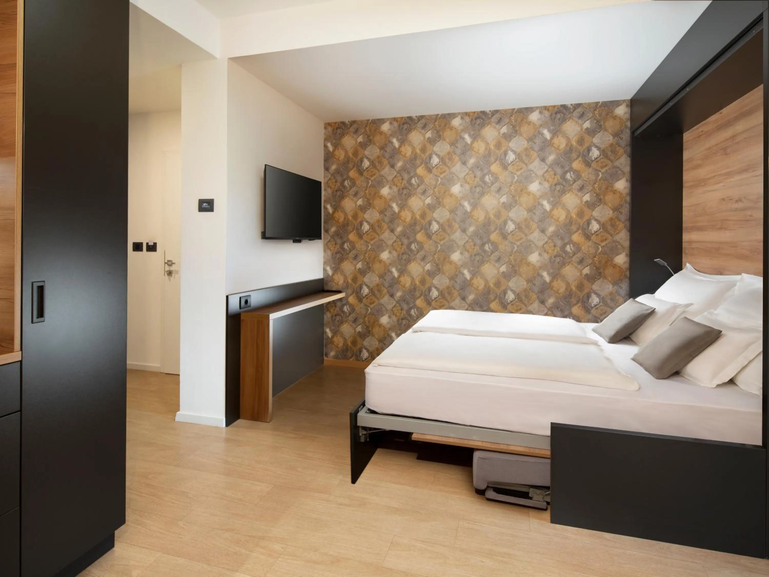 Living room, Bed in Ahotel Ljubljana