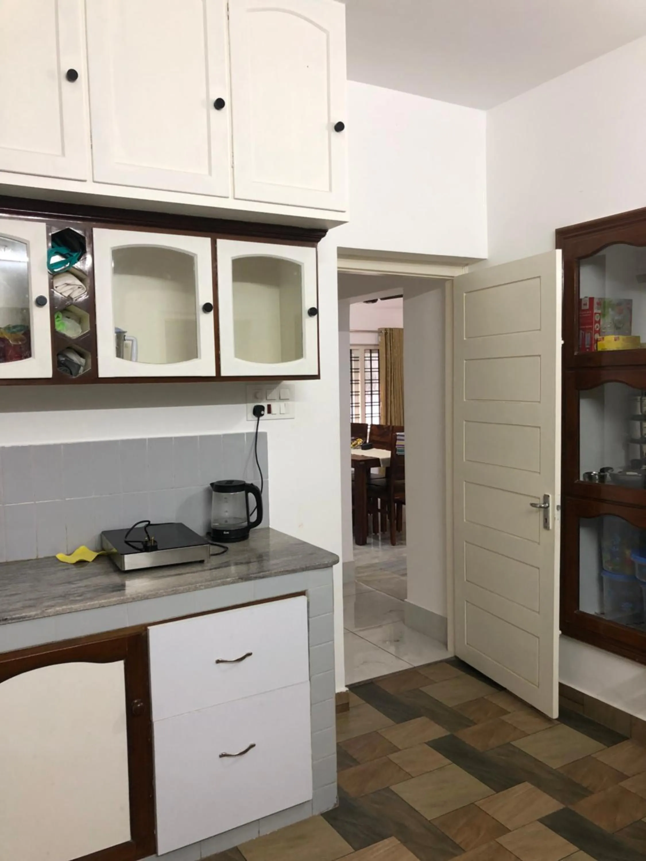 Kitchen or kitchenette in Sannidhi Home stay