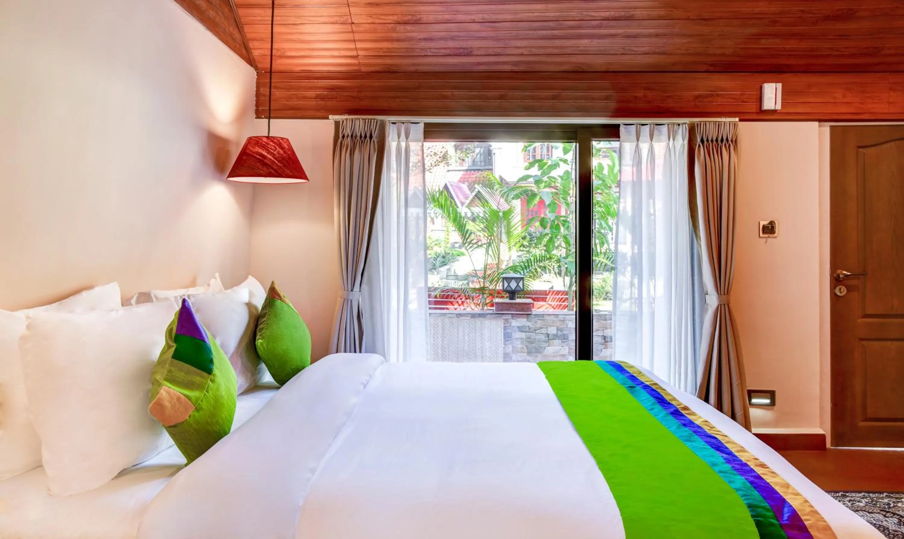 Bedroom, Bed in Treebo Premium Blue Mountain Country Club And Resort