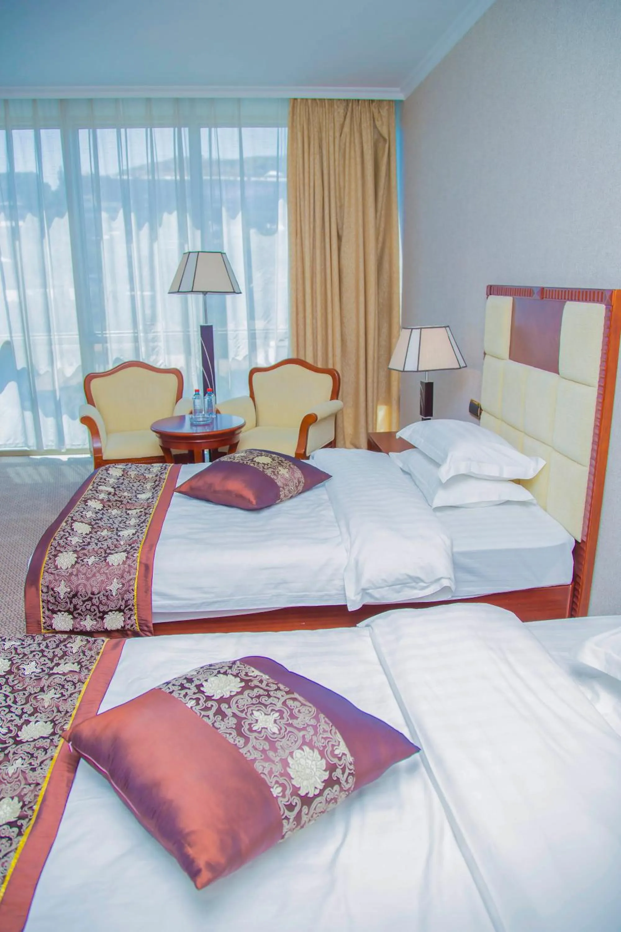 Photo of the whole room, Bed in Golden Coast Hotel