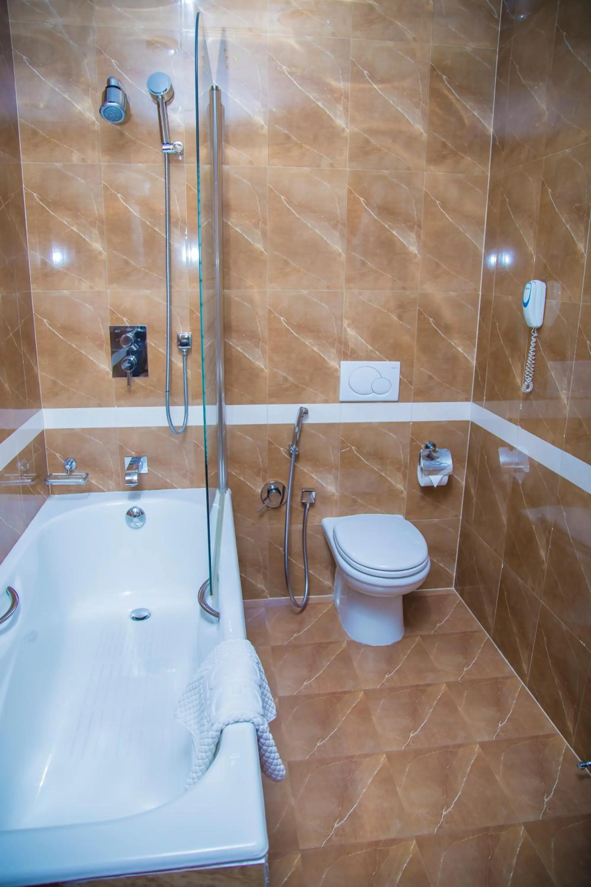 Toilet in Golden Coast Hotel