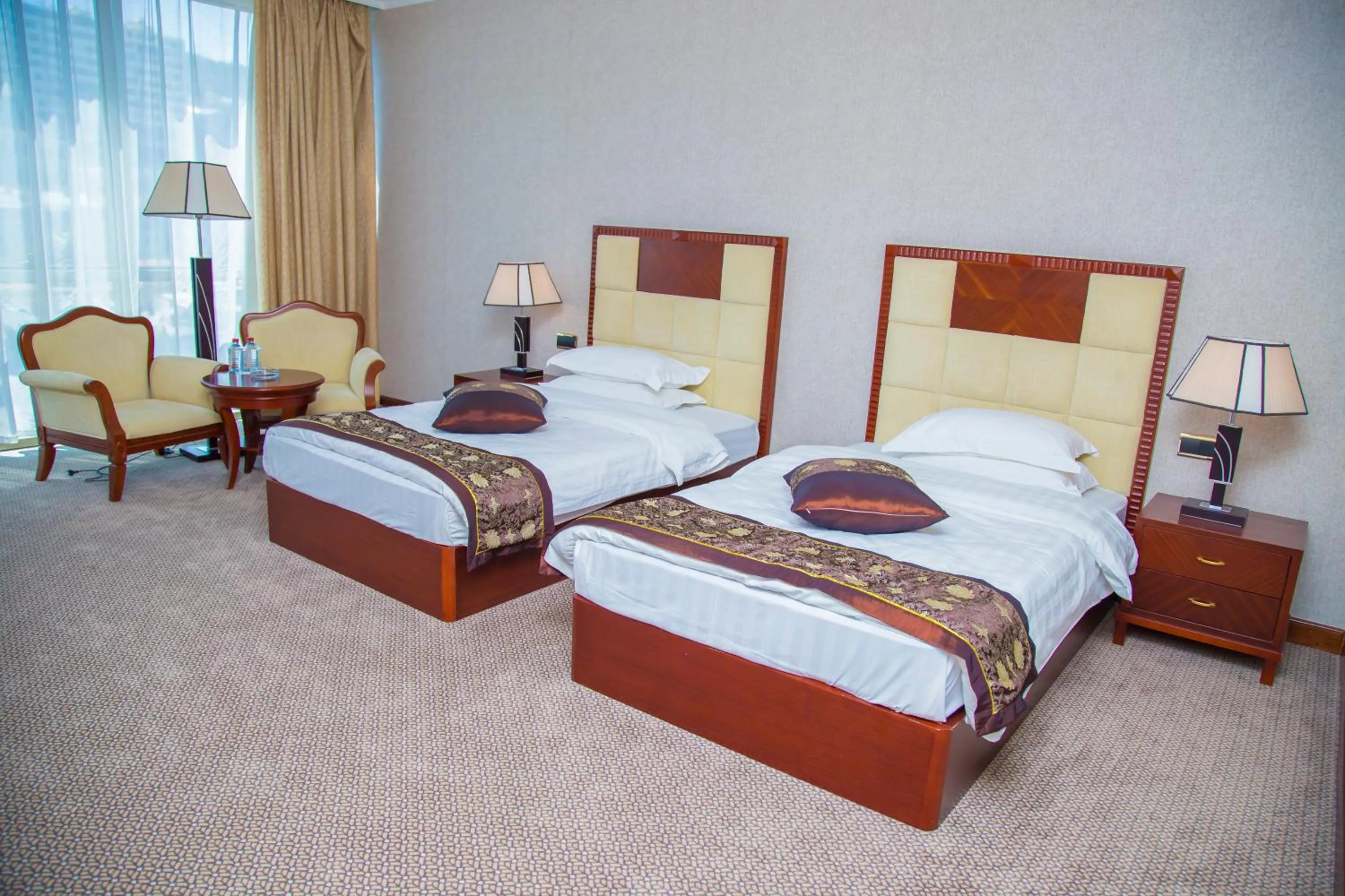 Photo of the whole room, Bed in Golden Coast Hotel