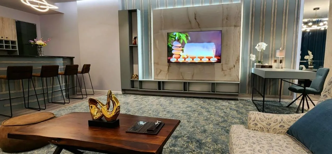 Communal lounge/ TV room in Qasr Al Sahab