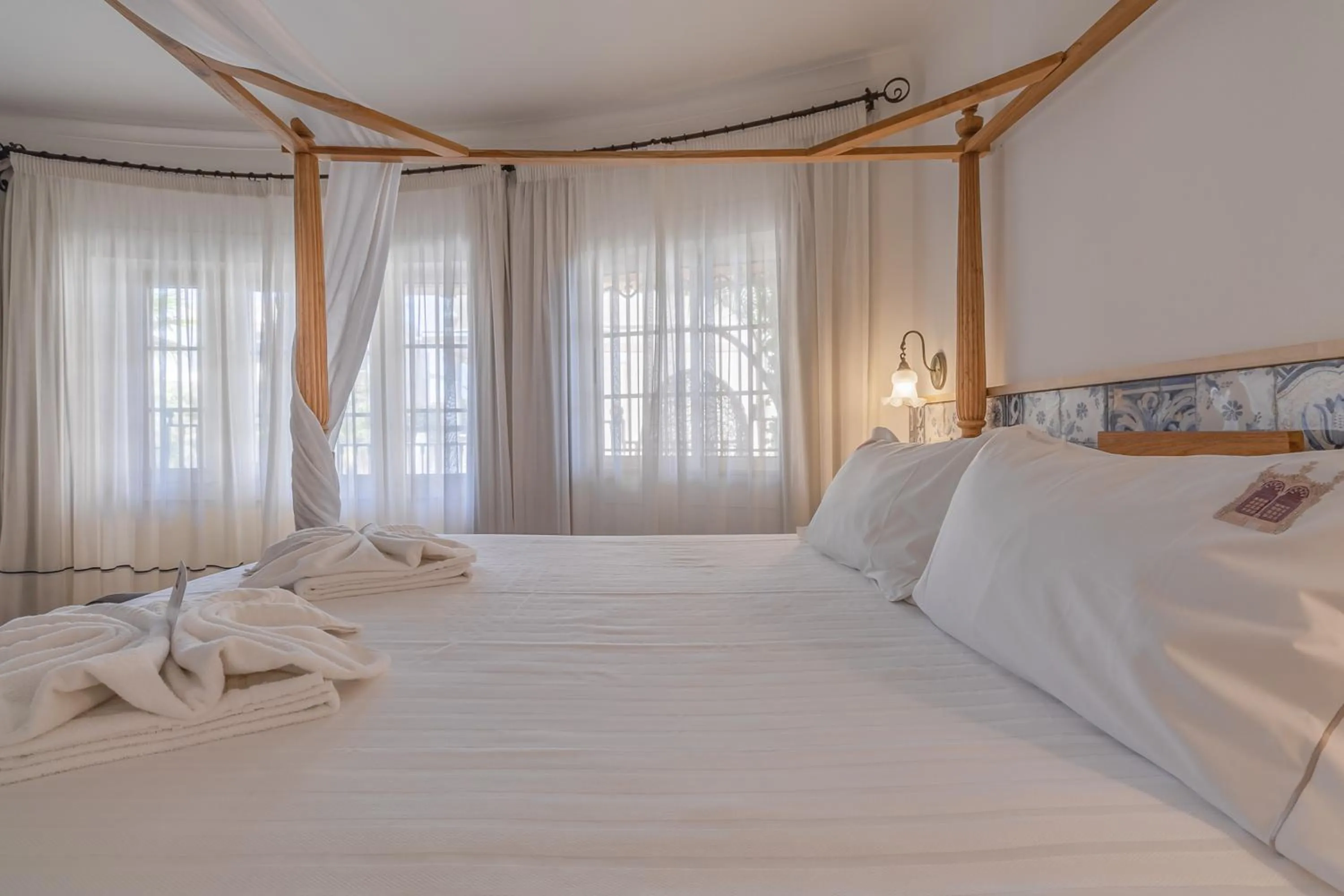Bed in Charming Residence & Guest House Dom Manuel I Adults only