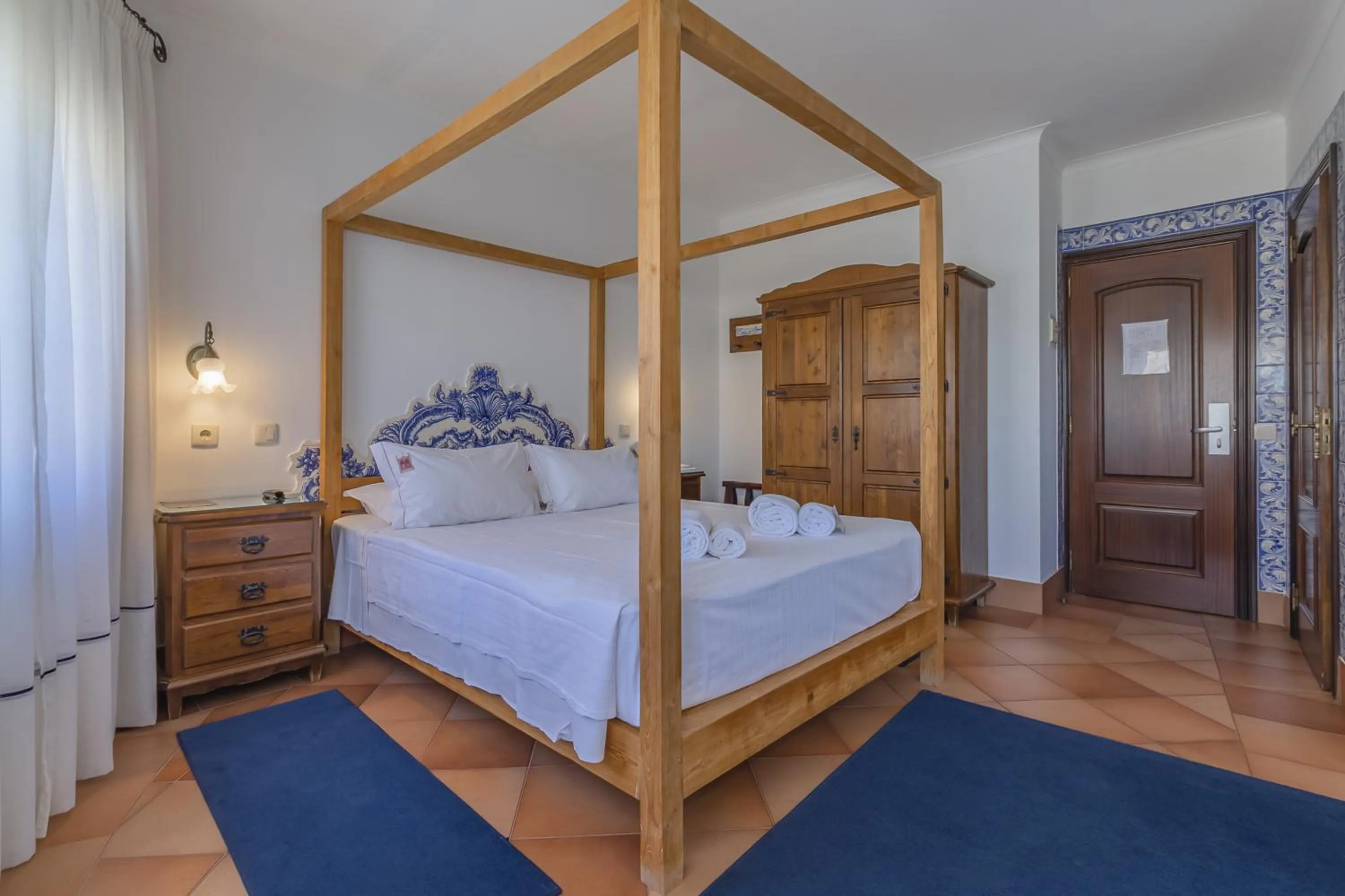 Bed in Charming Residence & Guest House Dom Manuel I Adults only