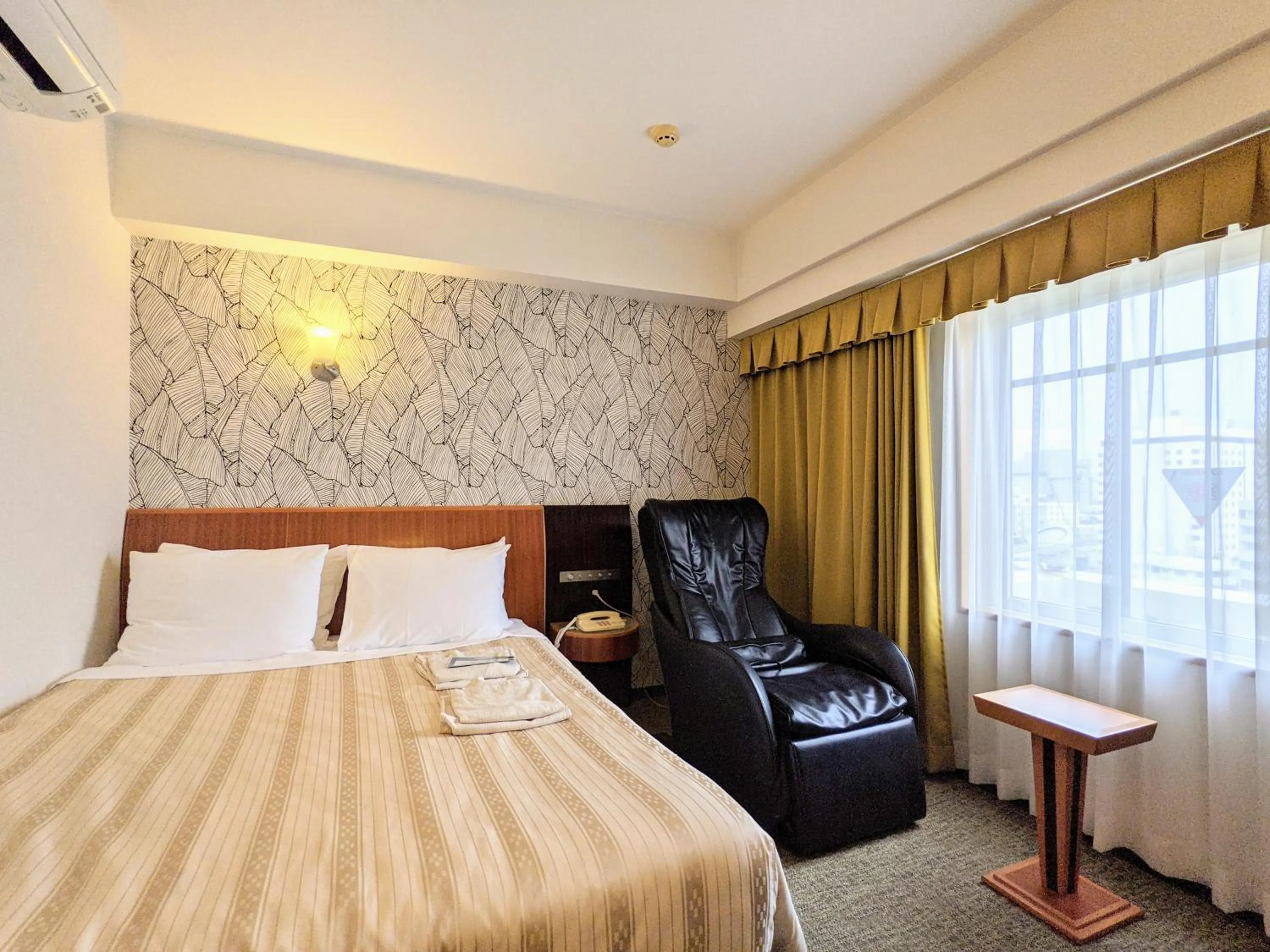 Bed in GRG Hotel Naha Higashimachi