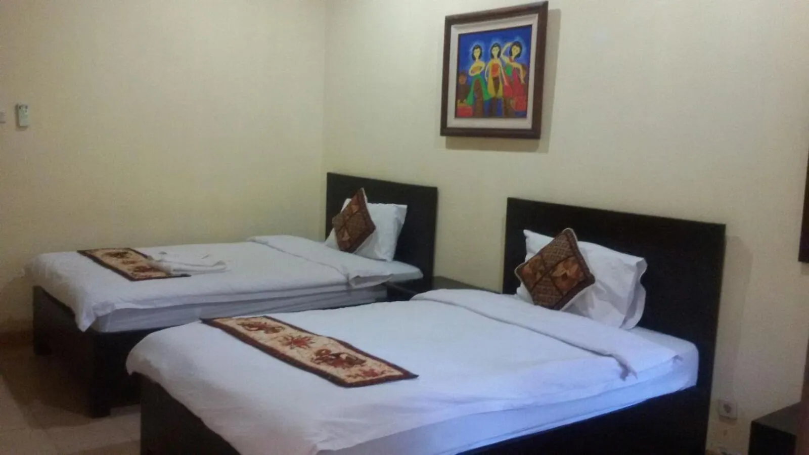 Bed in Alam Jogja Resort Mitra RedDoorz