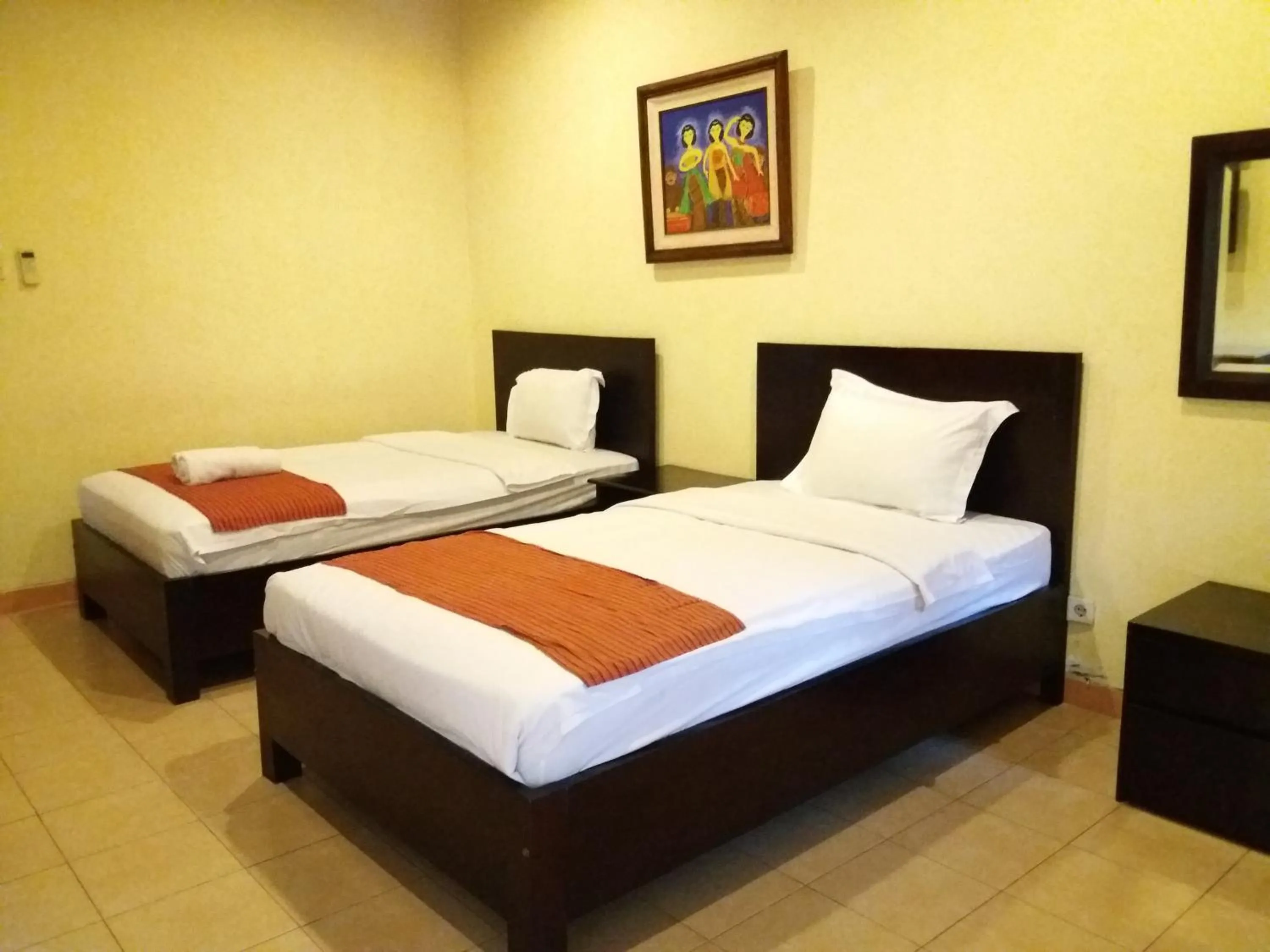 Bed in Alam Jogja Resort Mitra RedDoorz