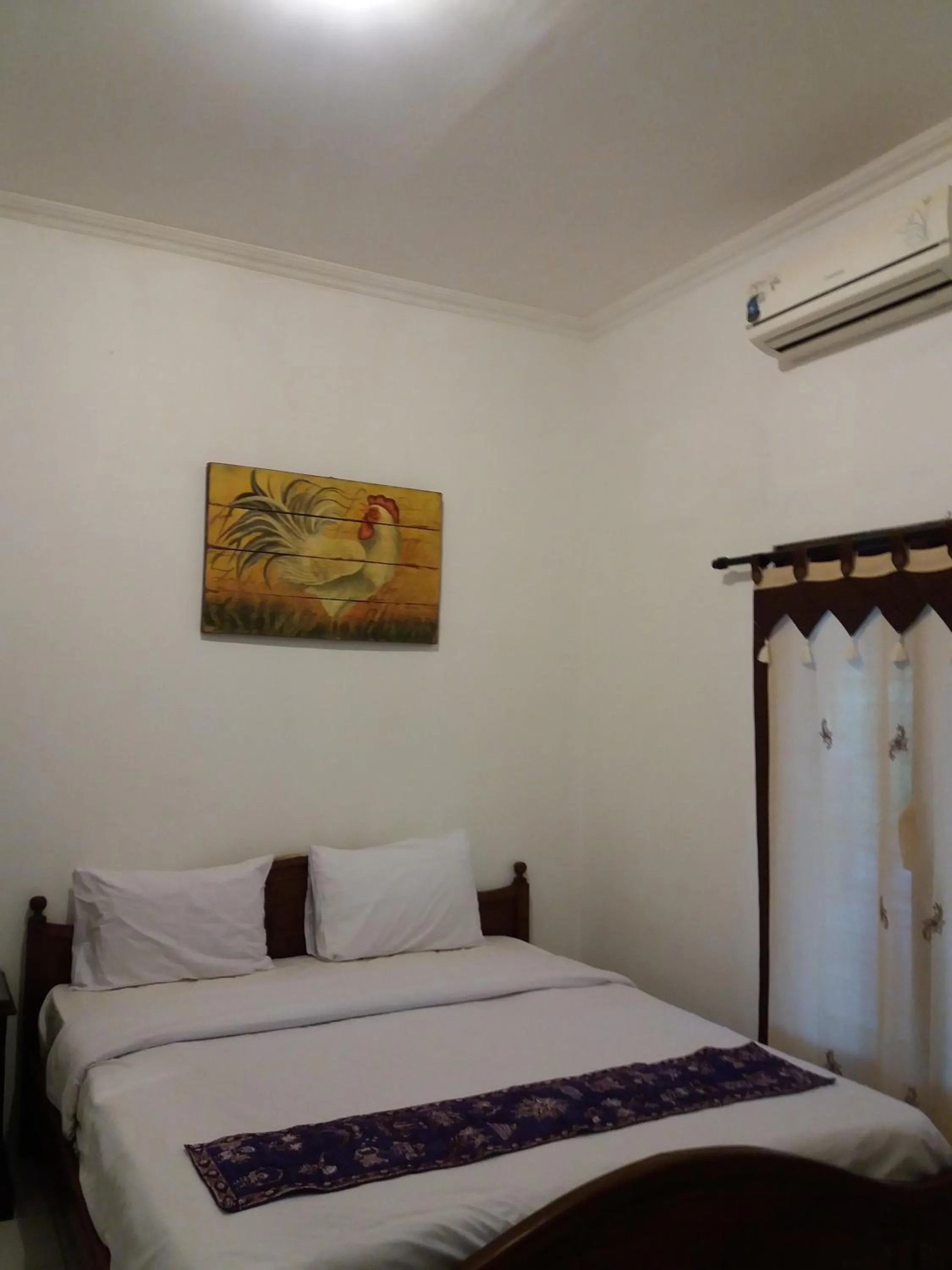 Bed in Alam Jogja Resort Mitra RedDoorz