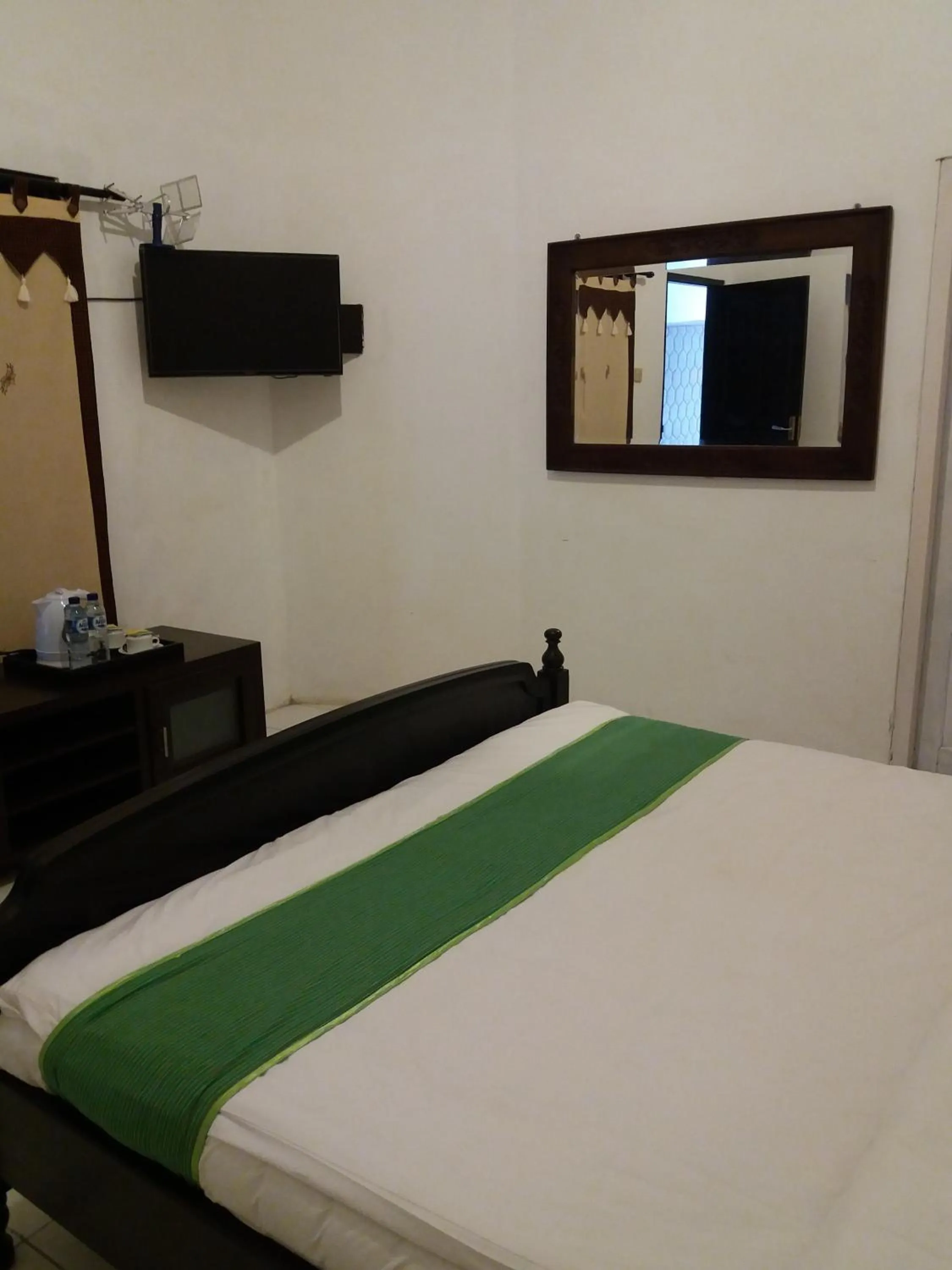 Bed in Alam Jogja Resort Mitra RedDoorz