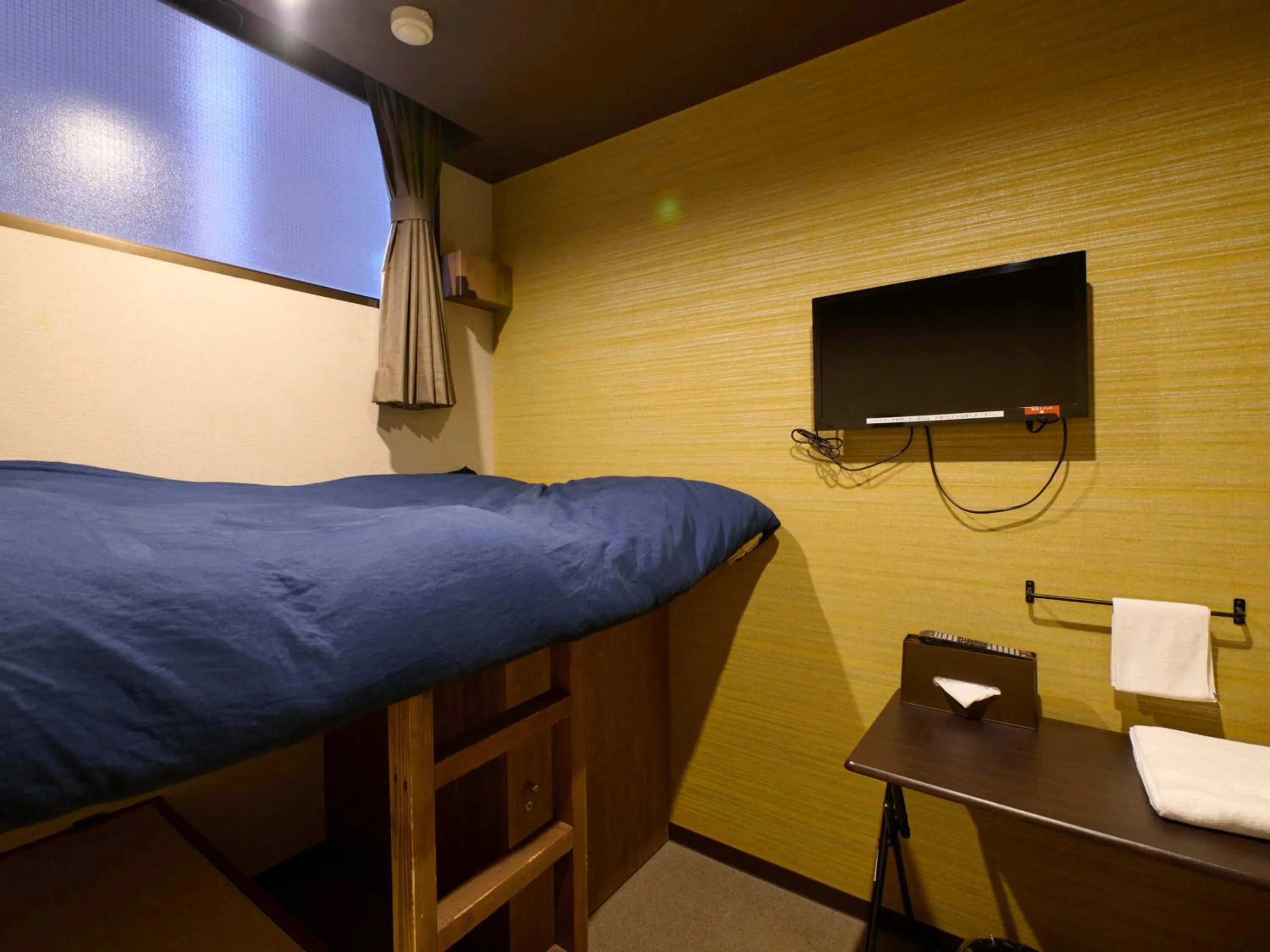 Bed in Tabist Hotel Seishokan