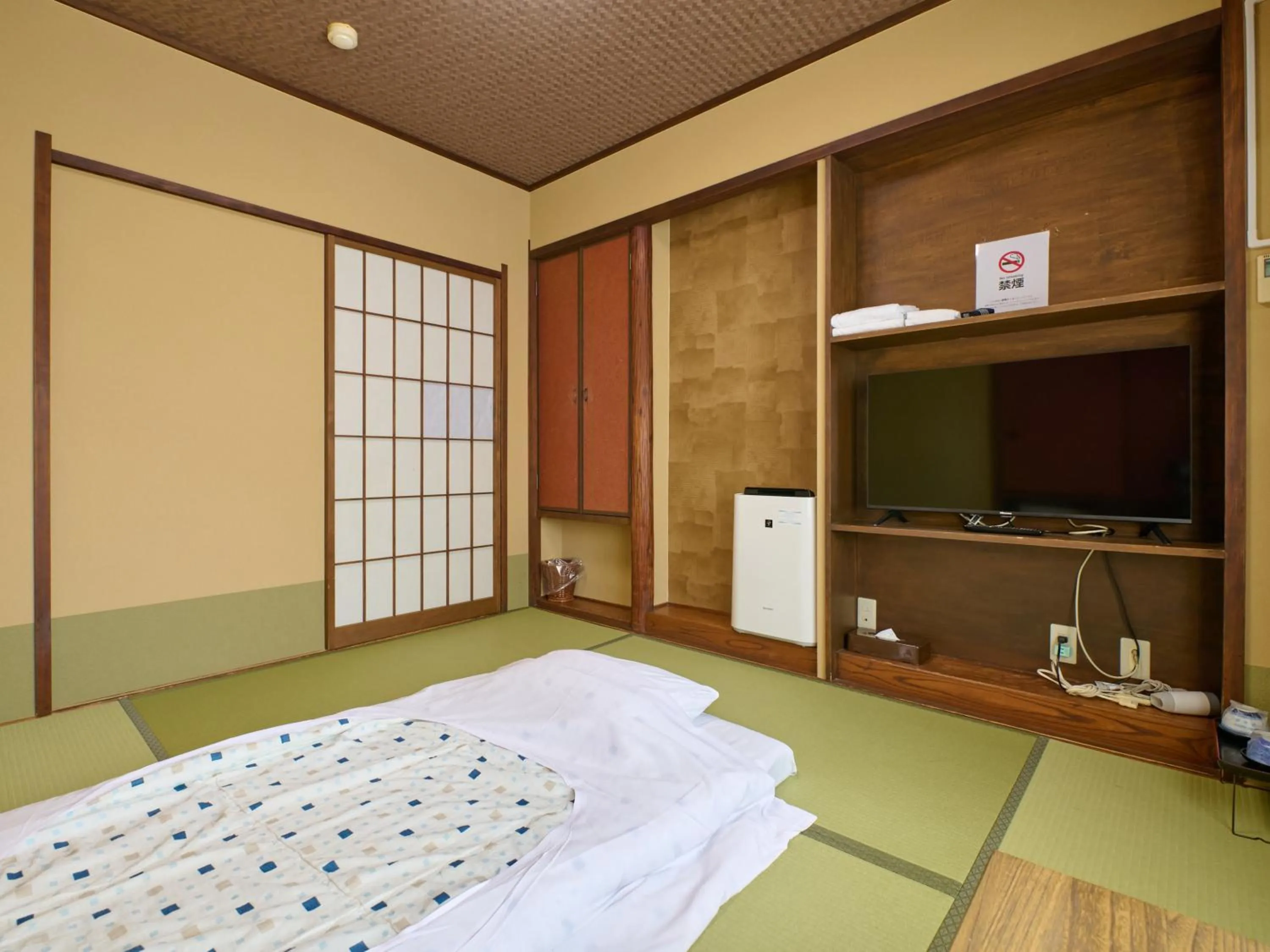 Bed in Tabist Hotel Seishokan