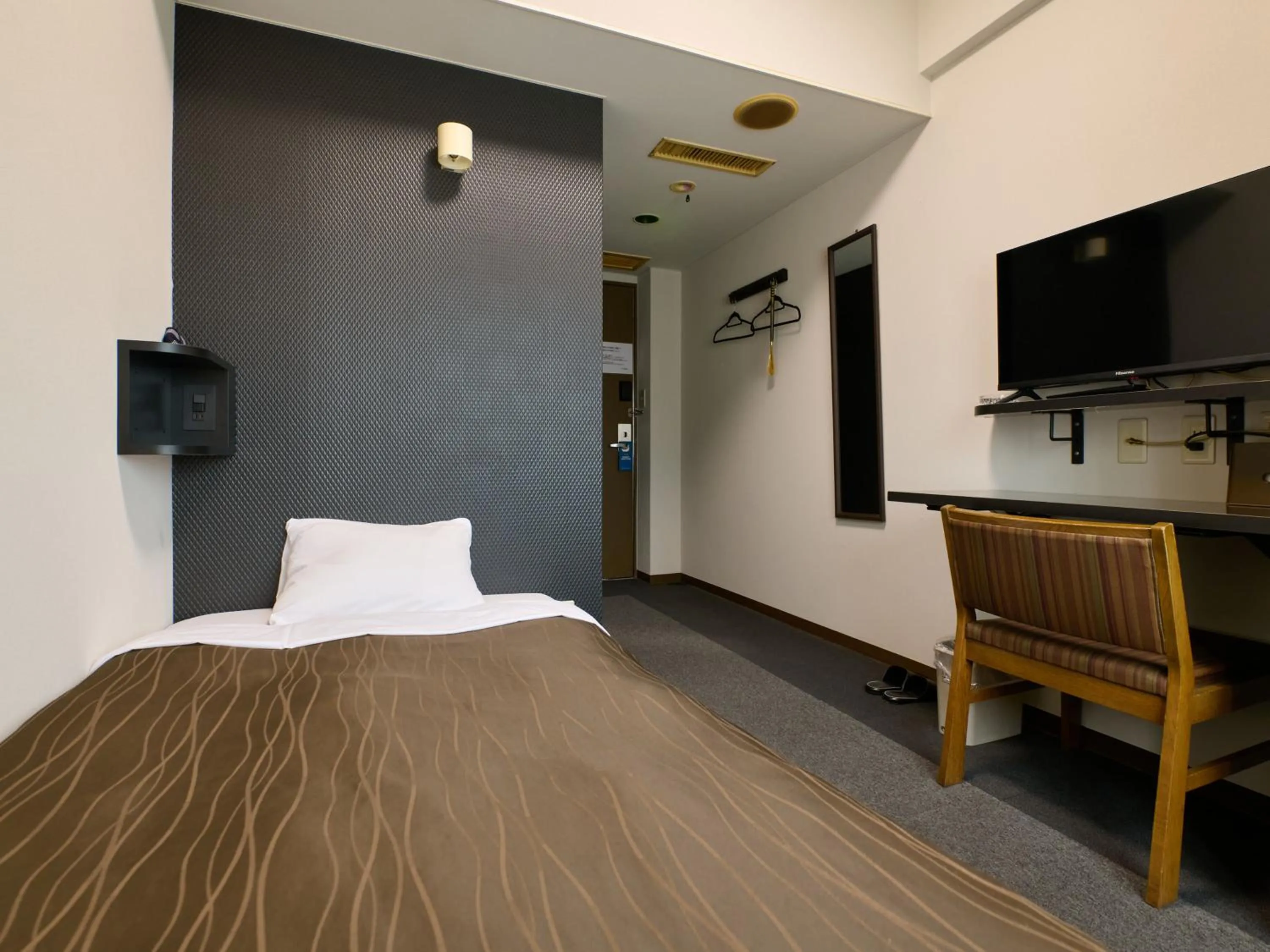 Bed in Tabist Hotel Seishokan