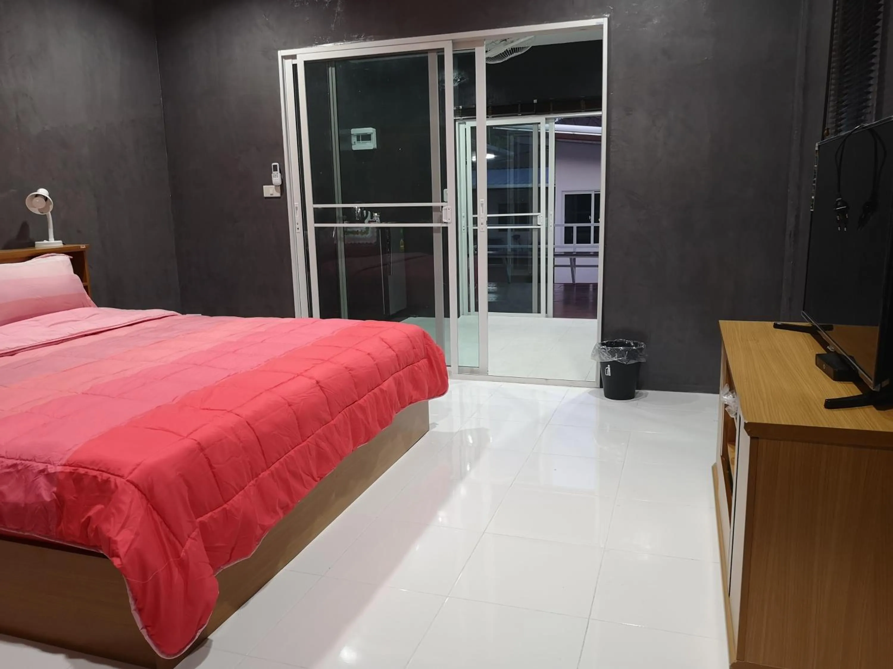 Bed in Baan Sabaijai Resort