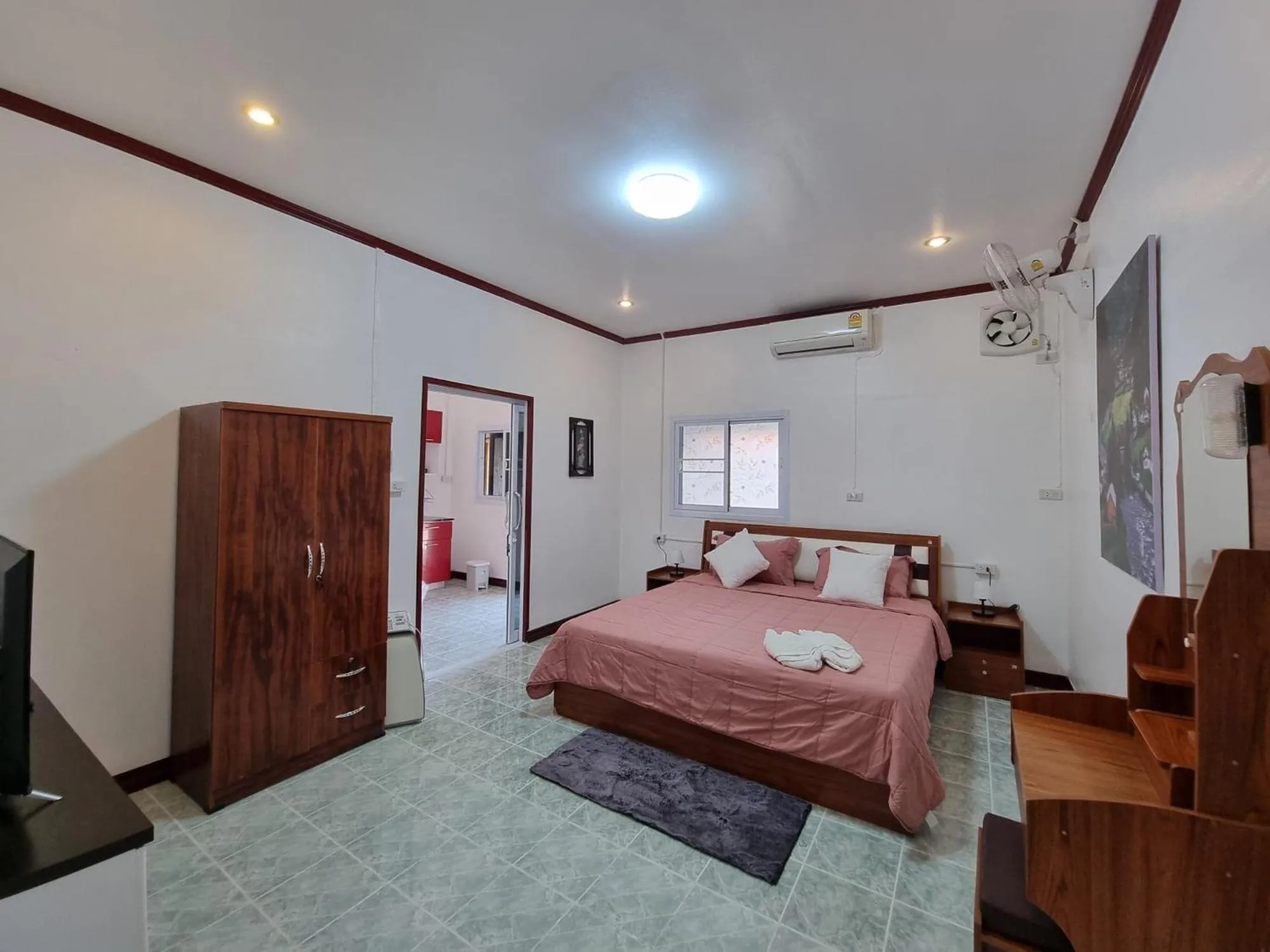 Bed in Baan Sabaijai Resort