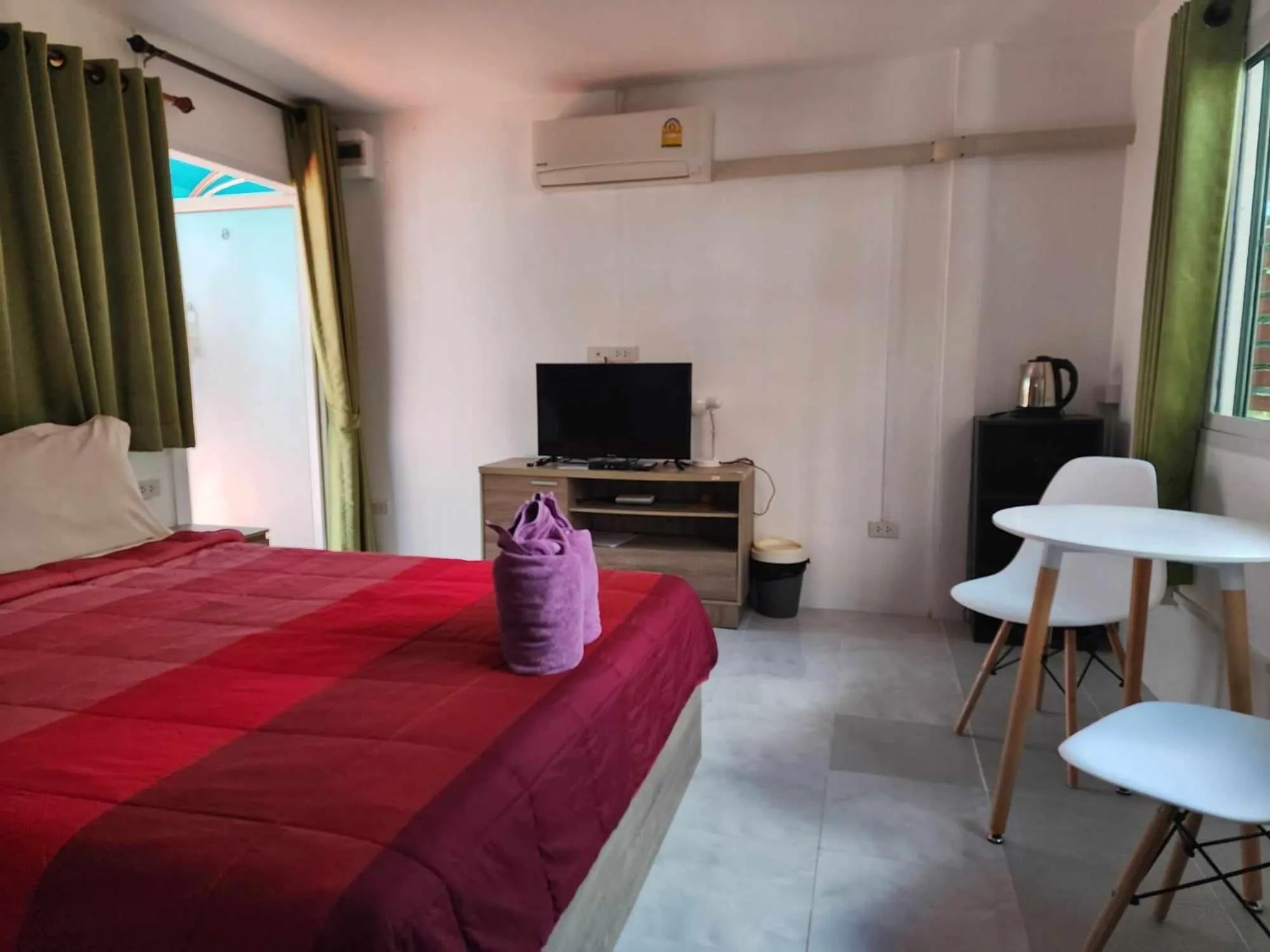 Bed in Baan Sabaijai Resort