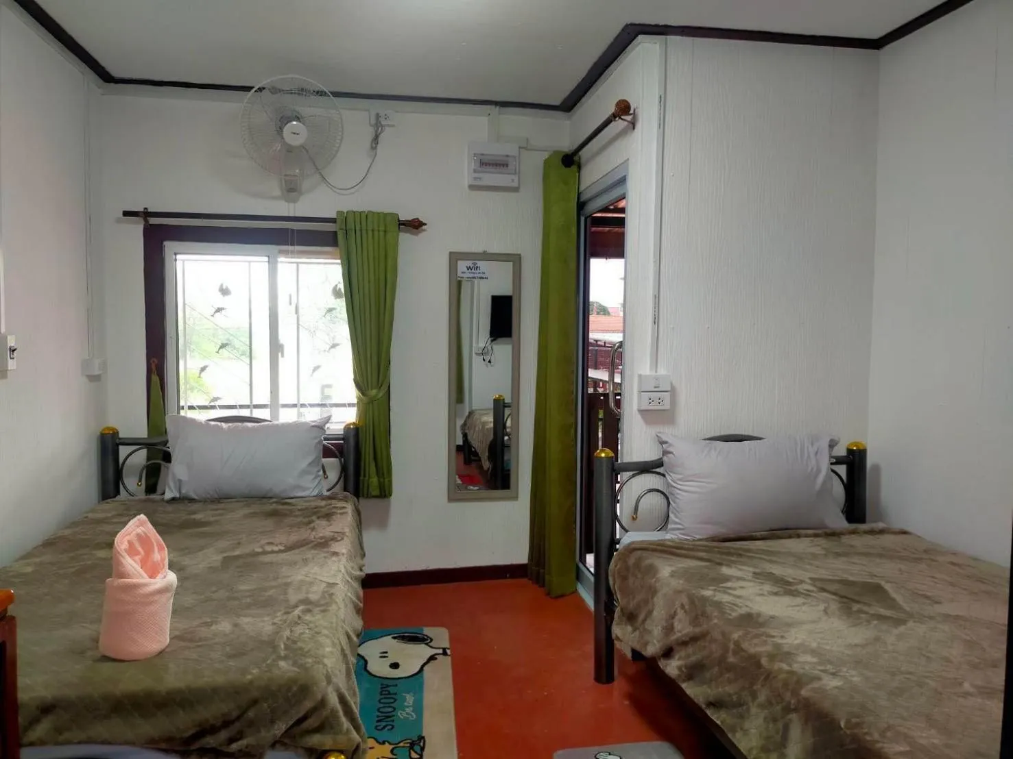 Bed in Baan Sabaijai Resort