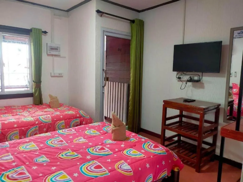 Bed in Baan Sabaijai Resort