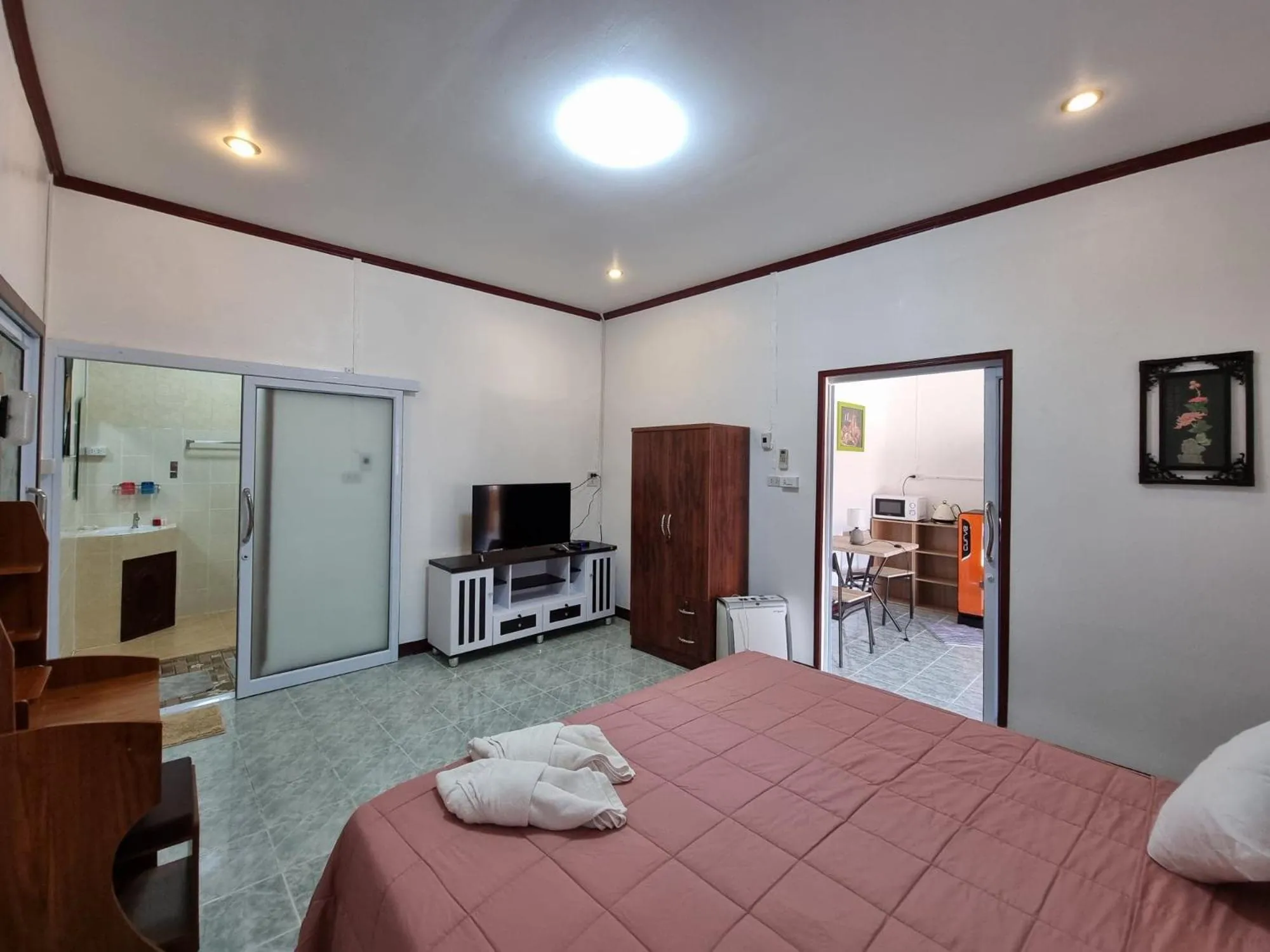 Bed in Baan Sabaijai Resort