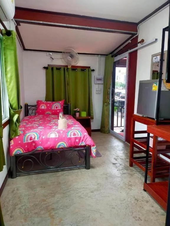 Bed in Baan Sabaijai Resort