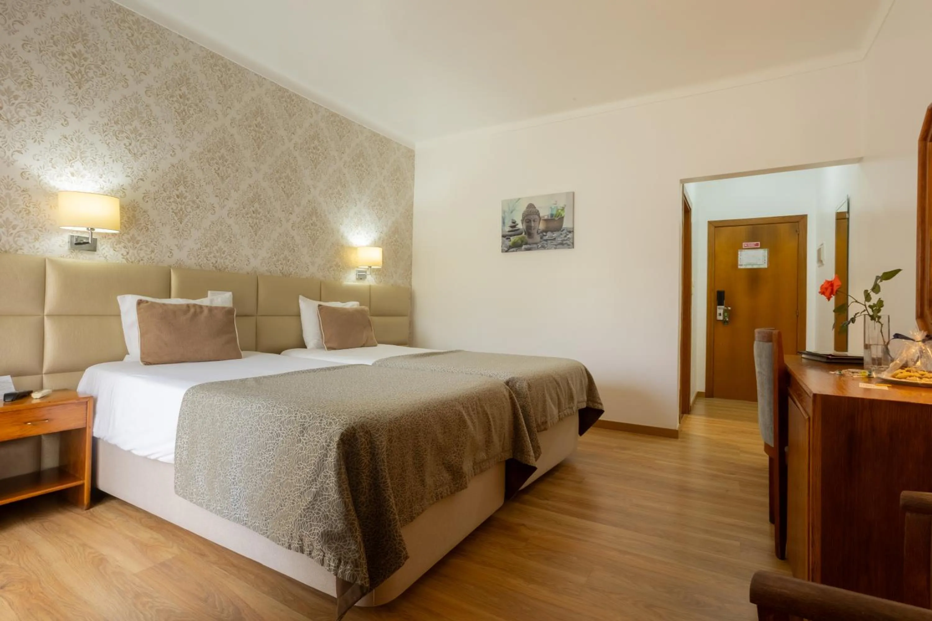 Bed in Hotel Sao Jorge Garden