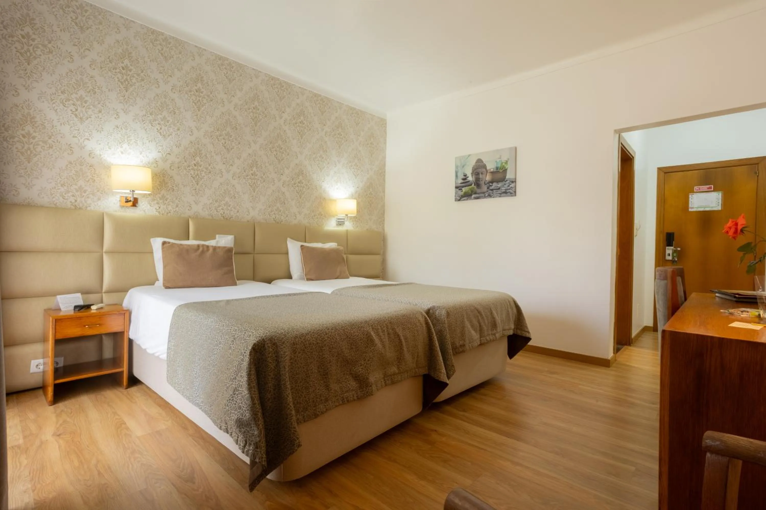 Bed in Hotel Sao Jorge Garden