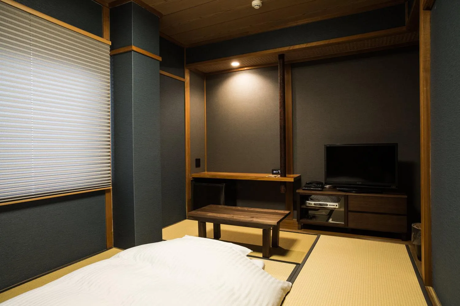 Bed in Hotel Daiei Masuda