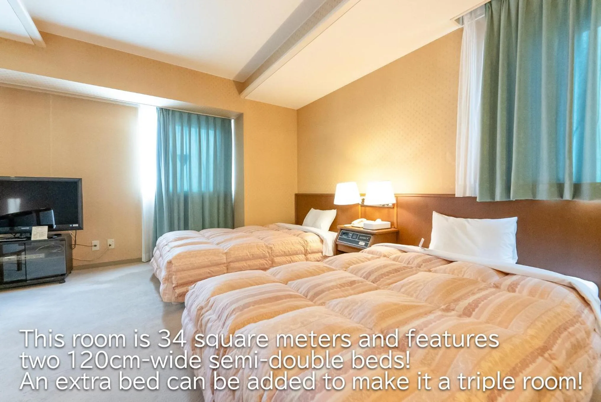 Bed in Tendo Central Hotel