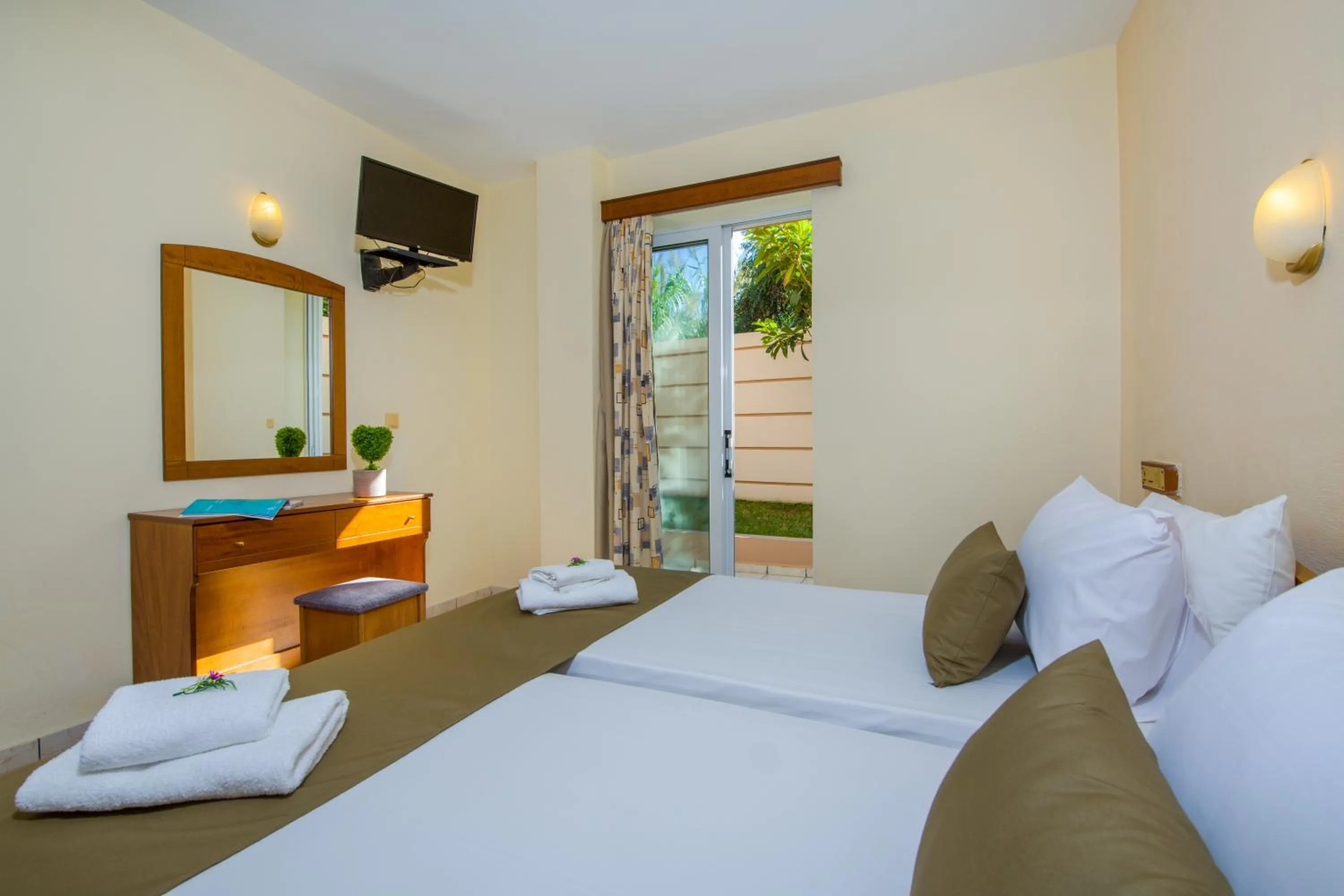 Bed in Dias Hotel Apartments