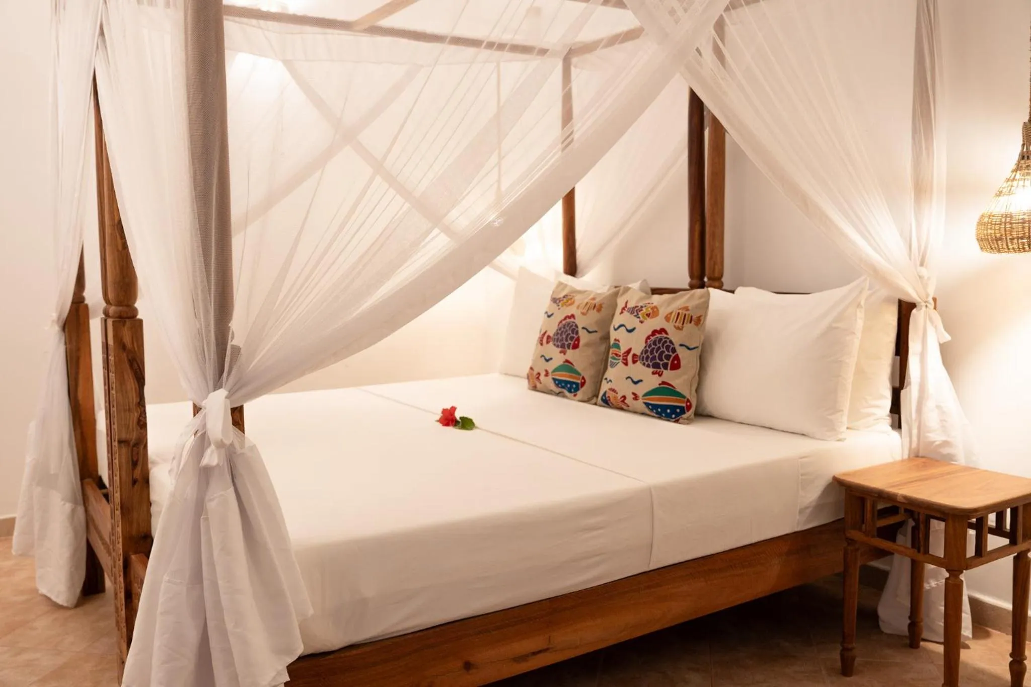 Bed in Mvuvi Boutique Resort
